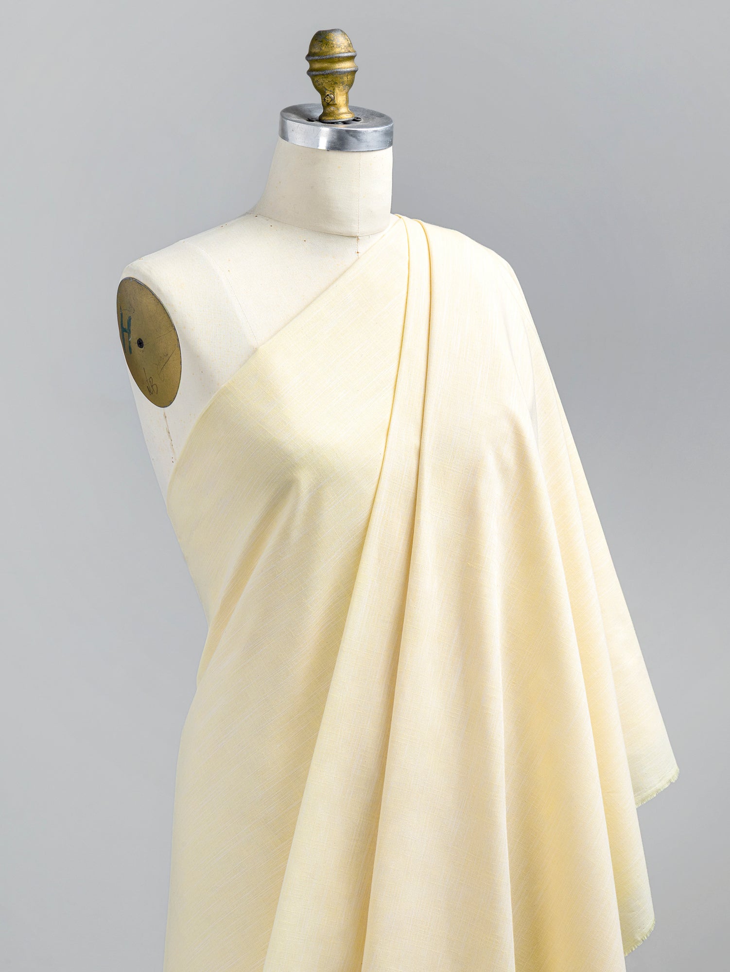 F-COT370-005-Softened-Cotton-Chambray-Shirting-Butter-Yellow-Core-Fabrics-draped.JPG