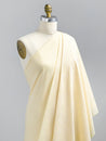 F-COT370-005-Softened-Cotton-Chambray-Shirting-Butter-Yellow-Core-Fabrics-draped.JPG