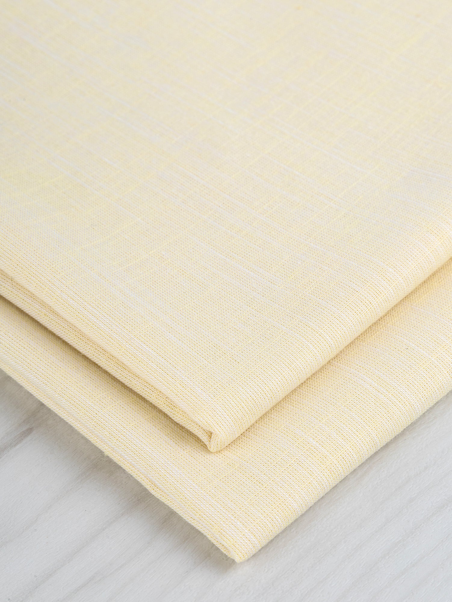 F-COT370-005-Softened-Cotton-Chambray-Shirting-Butter-Yellow-Core-Fabrics-fold.JPG