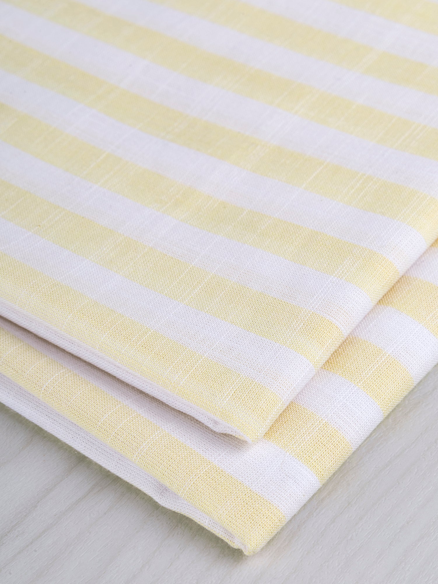 F-COT371-002-Softened-Striped-Cotton-Shirting-Butter-Yellow+White-Core-Fabrics-fold.JPG