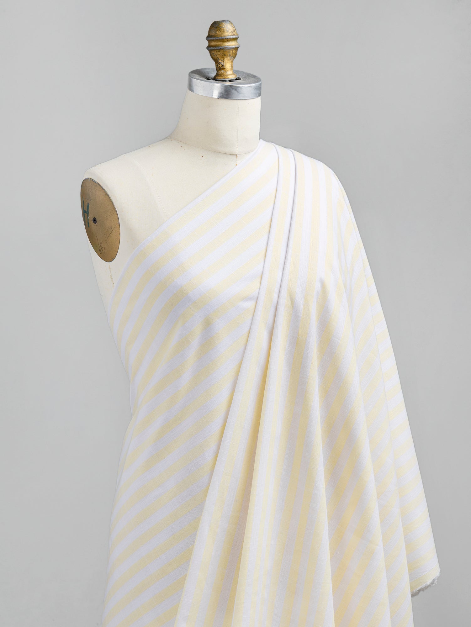 F-COT371-002-Softened-Striped-Cotton-Shirting-Butter-Yellow+White-Core-Fabrics-draped.JPG