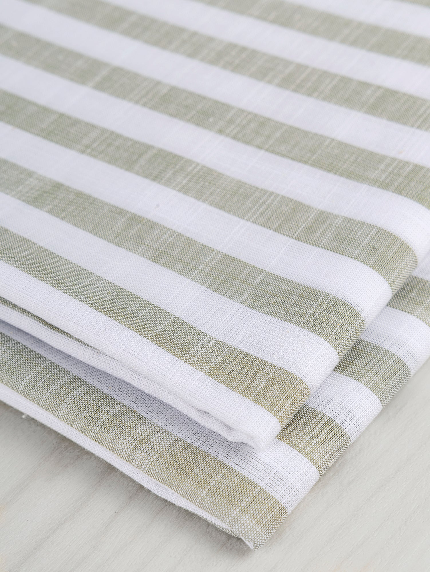 F-COT371-004-Softened-Striped-Cotton-Shirting-Sage+White-Core-Fabrics-fold.JPG
