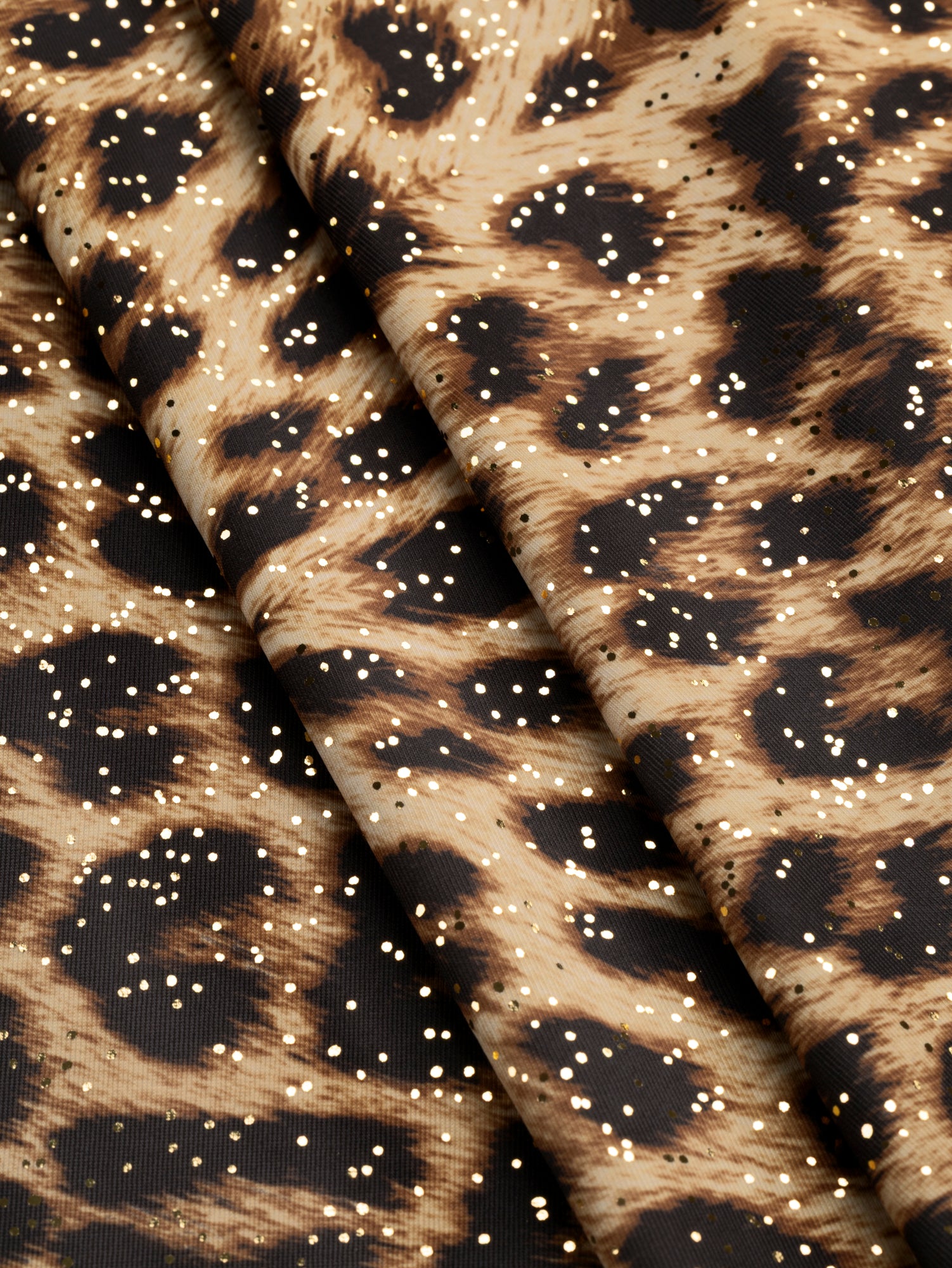 F-DEA105-Sparkle-Leopard-Stretch-Knit-Gold-and-Black-Core-Fabrics-fold.JPG