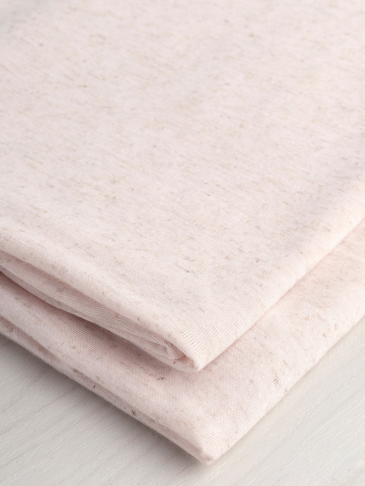 F-DEA064-001-Speckle-Cotton-Jersey-Deadstock-Light-Pink-Core-Fabrics-fold.JPG