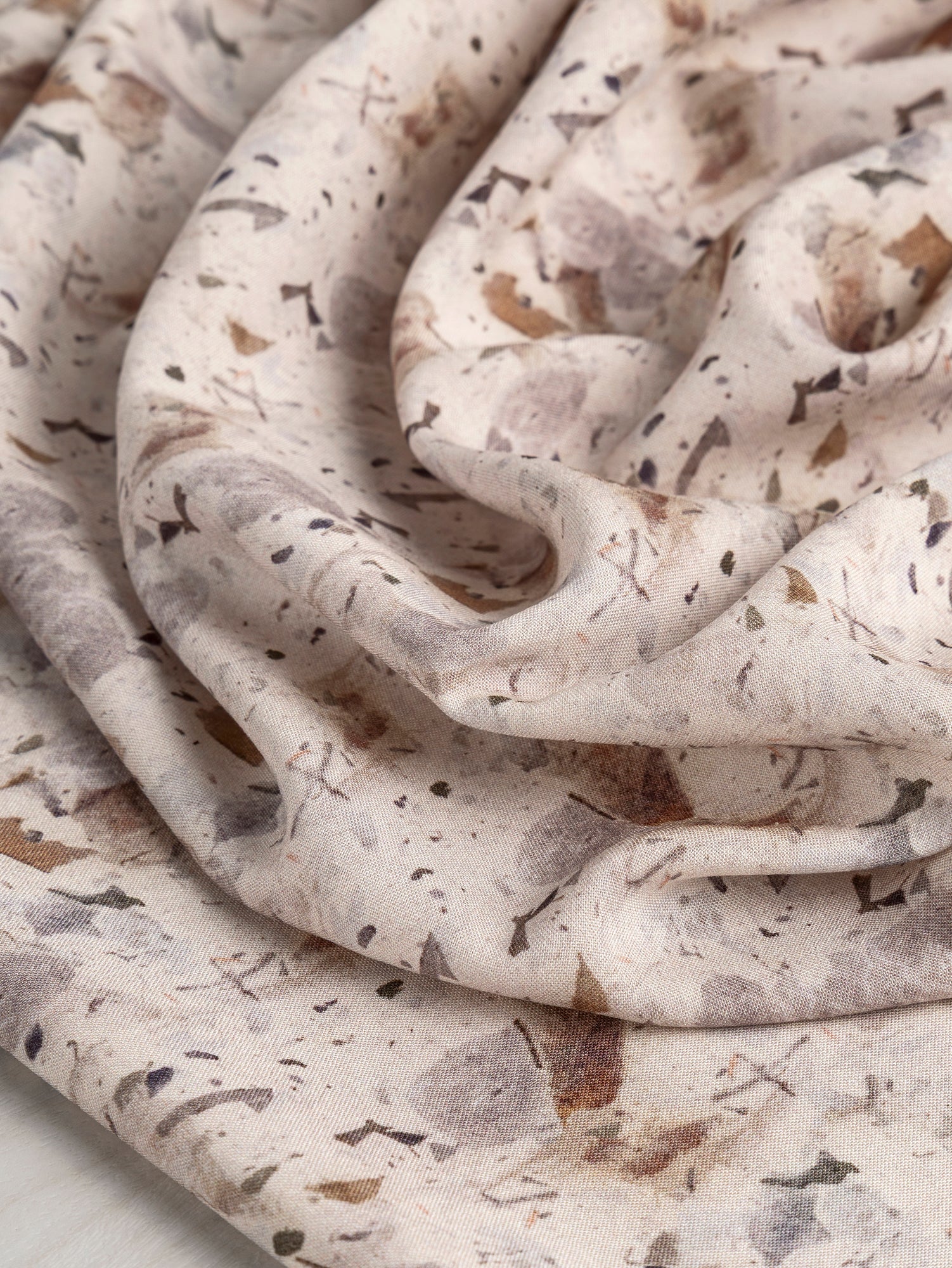F-DEA032-Speckle-Marble-Print-Viscose-Deadstock-Beige-Brown-and-Grey-Core-Fabrics-scrunched.JPG