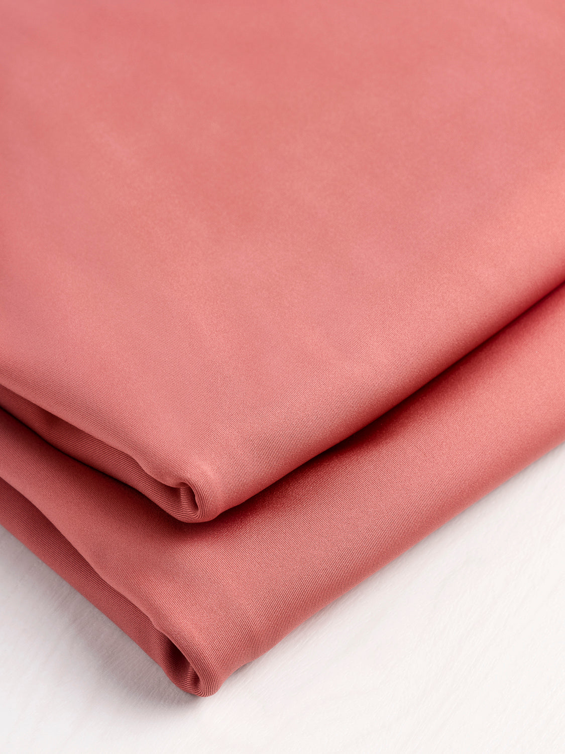 Plain Stretch Lining in Peach - Light weight polyester stretch fabric -  Fashion n Fabrics