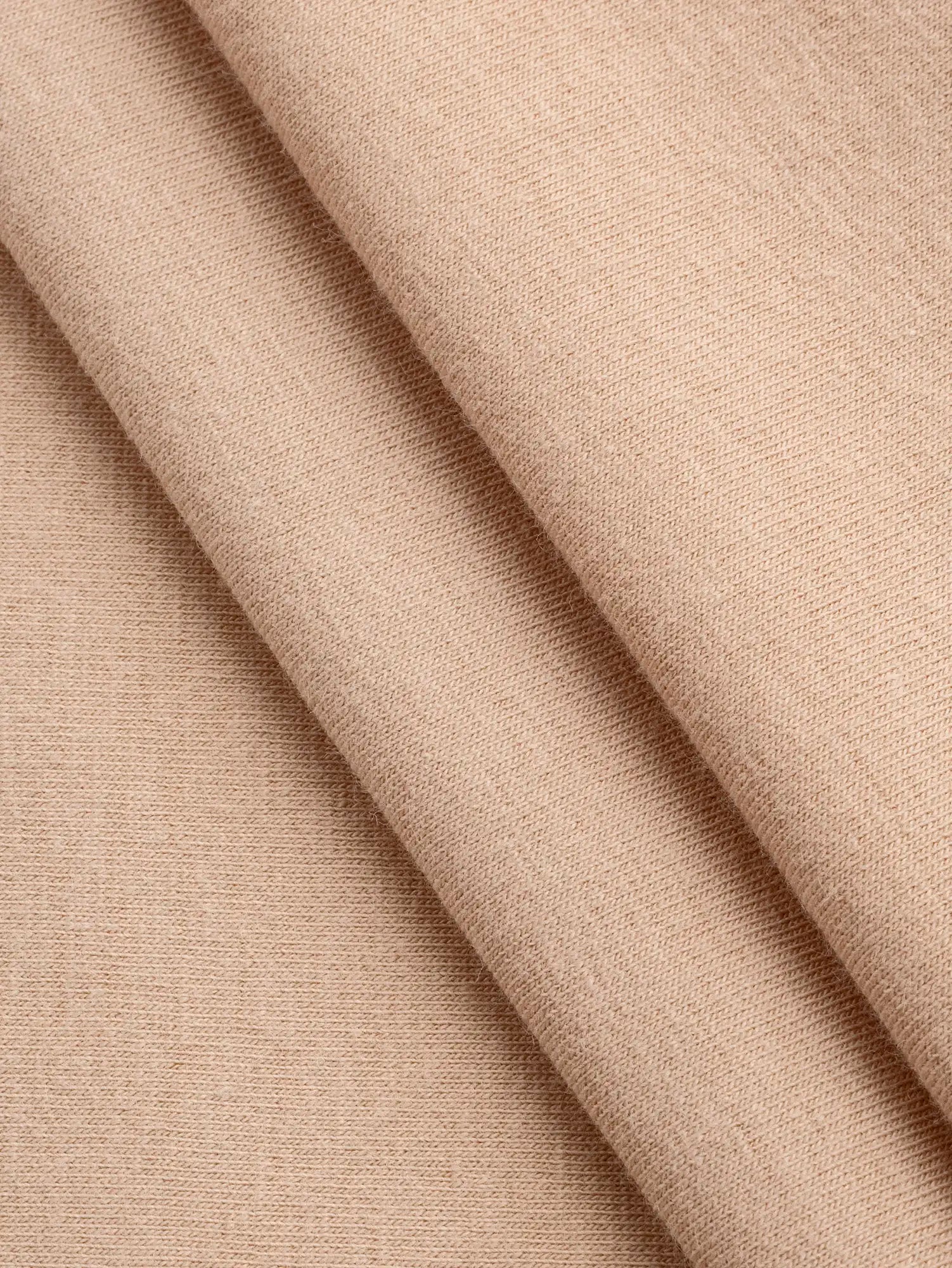 F-DEA231-Stretch-Cotton-Spandex-Jersey-Deadstock-Blush-Core-Fabrics-fold.webp