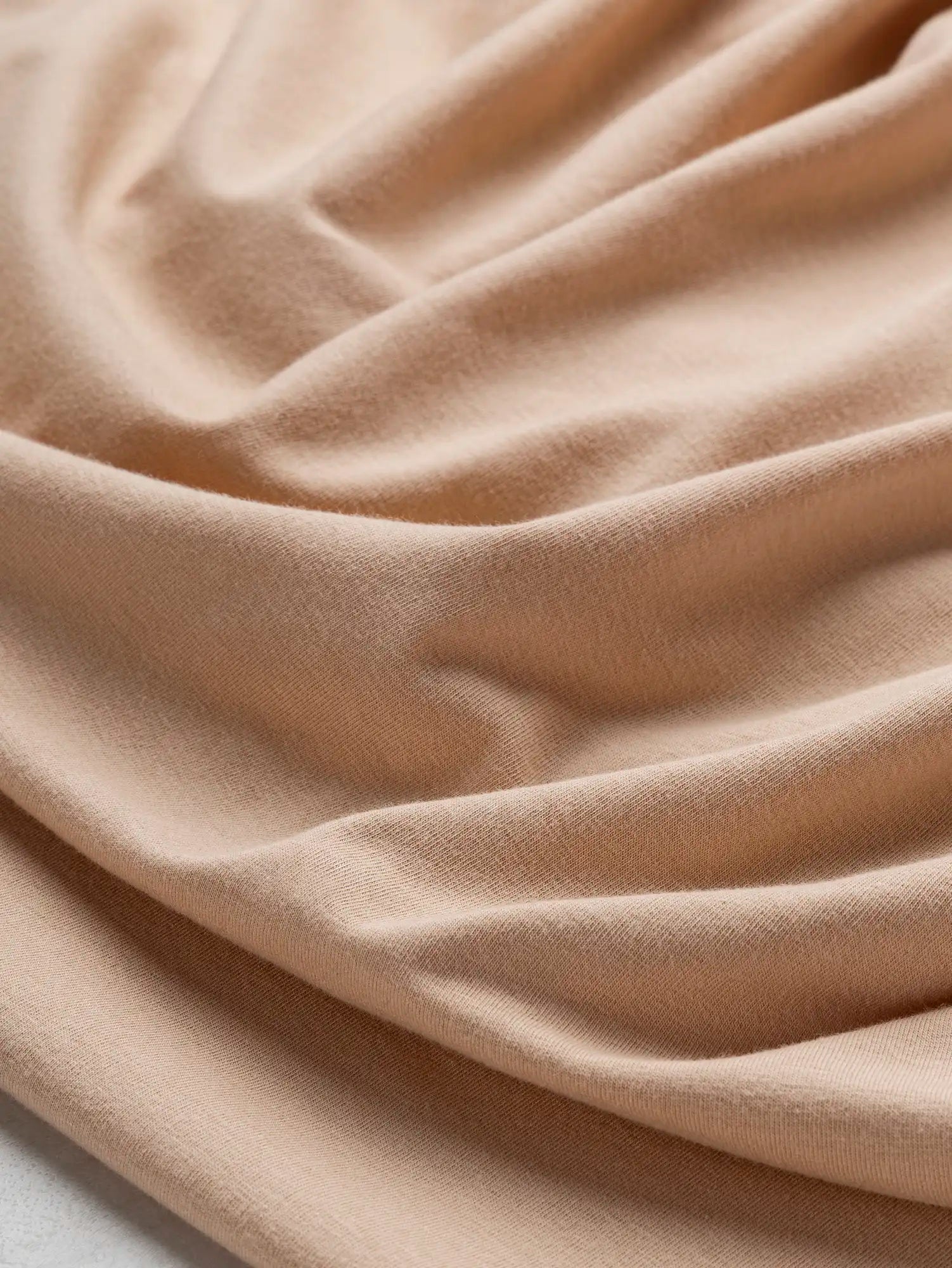 F-DEA231-Stretch-Cotton-Spandex-Jersey-Deadstock-Blush-Core-Fabrics-scrunched.webp