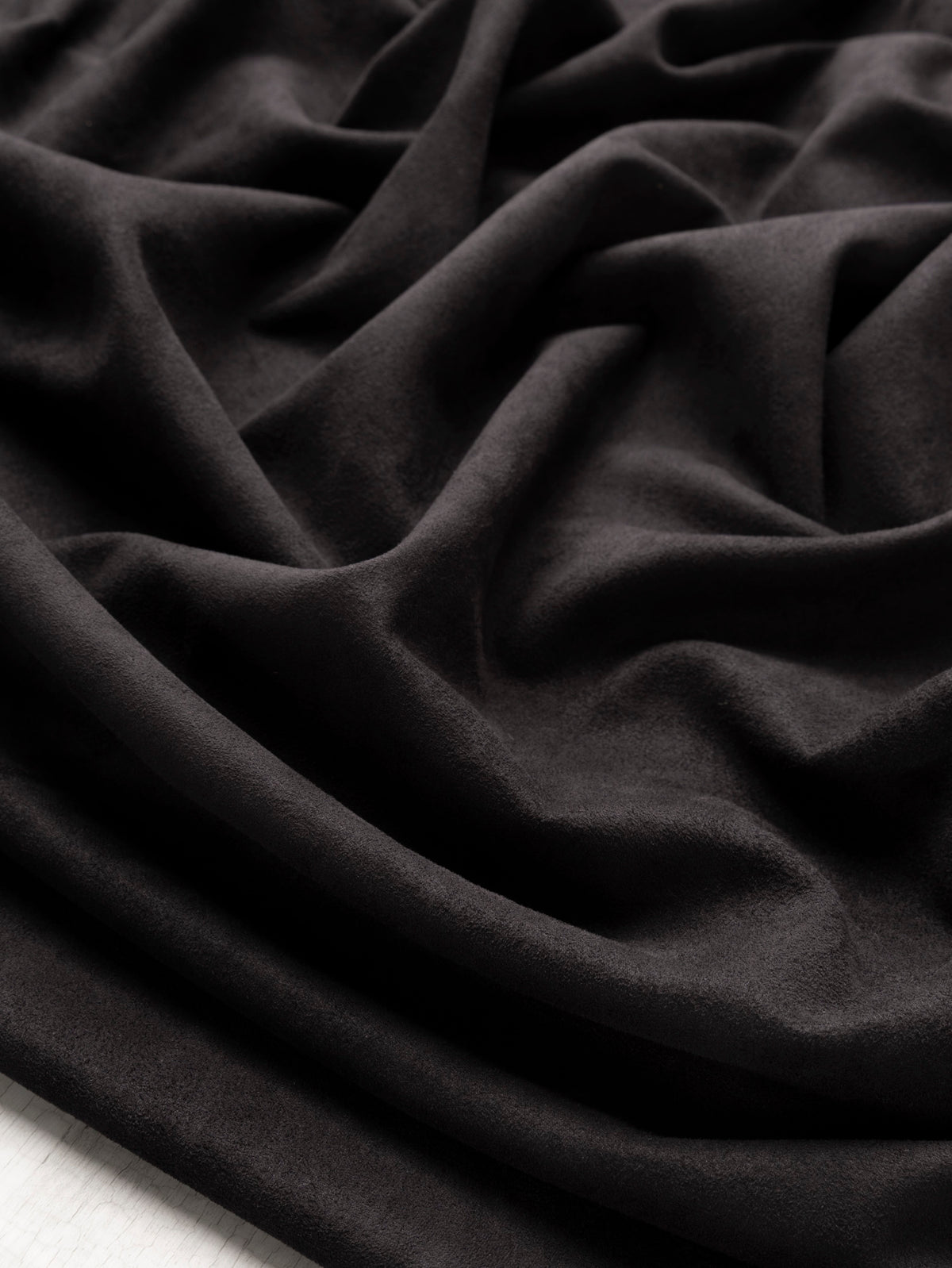 F-DEA262-Stretch-Microsuede-Deadstock-Black-Core-Fabrics-scrunched.webp