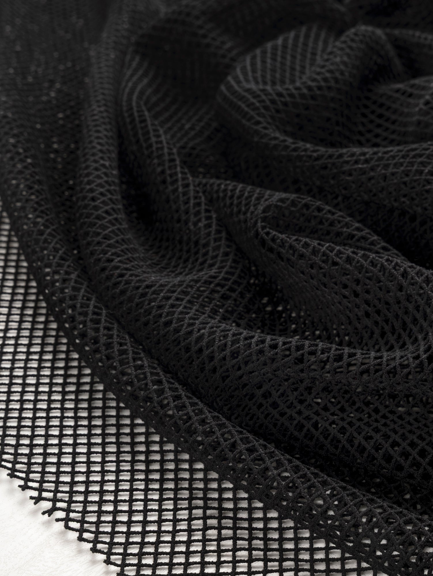 F-DEA100-Stretch-Nylon-Fishnet-Deadstock-Black-Core-Fabrics-scrunched.JPG