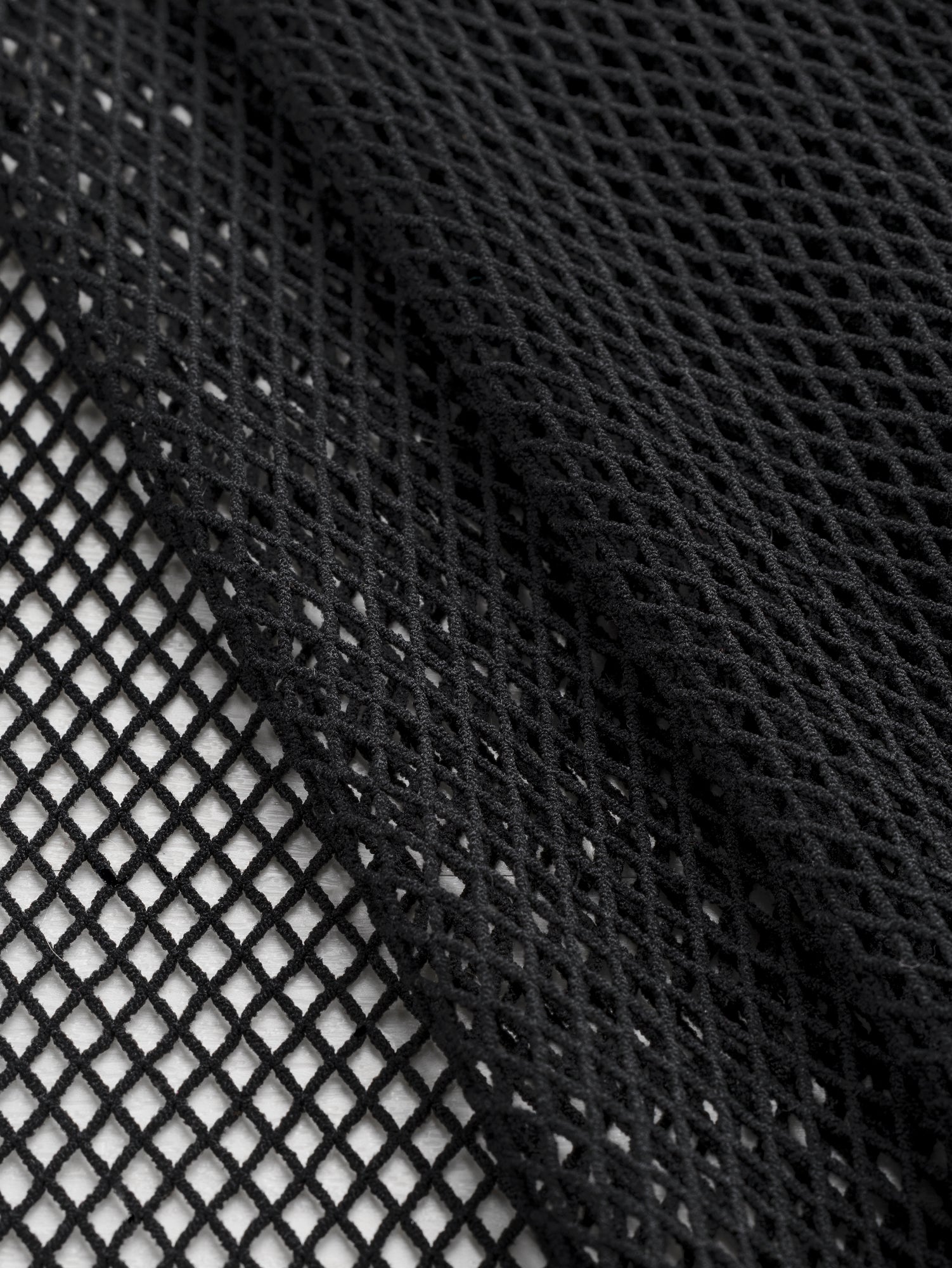 F-DEA100-Stretch-Nylon-Fishnet-Deadstock-Black-Core-Fabrics-fold.JPG