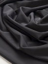 F-DEA101-Stretch-Poly-Elastane-Knit-Deadstock-Black-Core-Fabrics-scrunched.JPG
