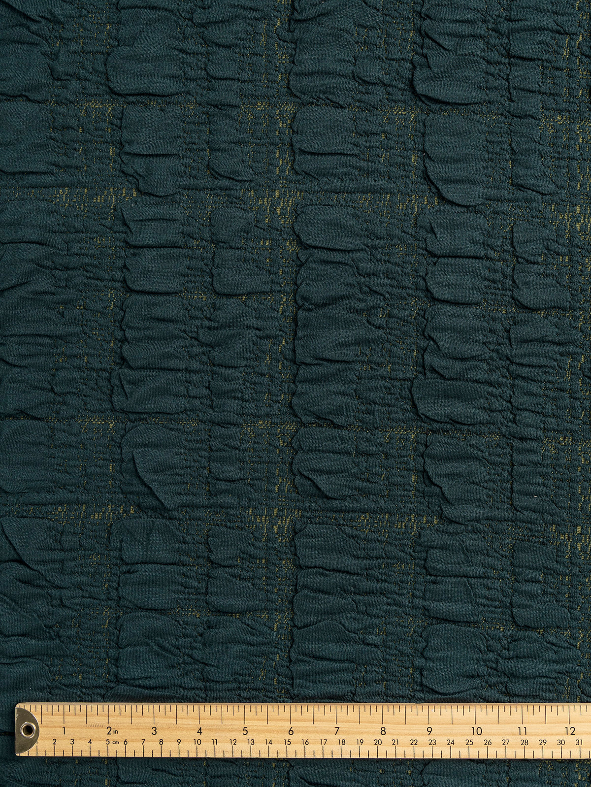 F-DEA256-002-Stretch-Quilted-Jacquard-Knit-Deadstock-Forest-Core-Fabrics-ruler.webp