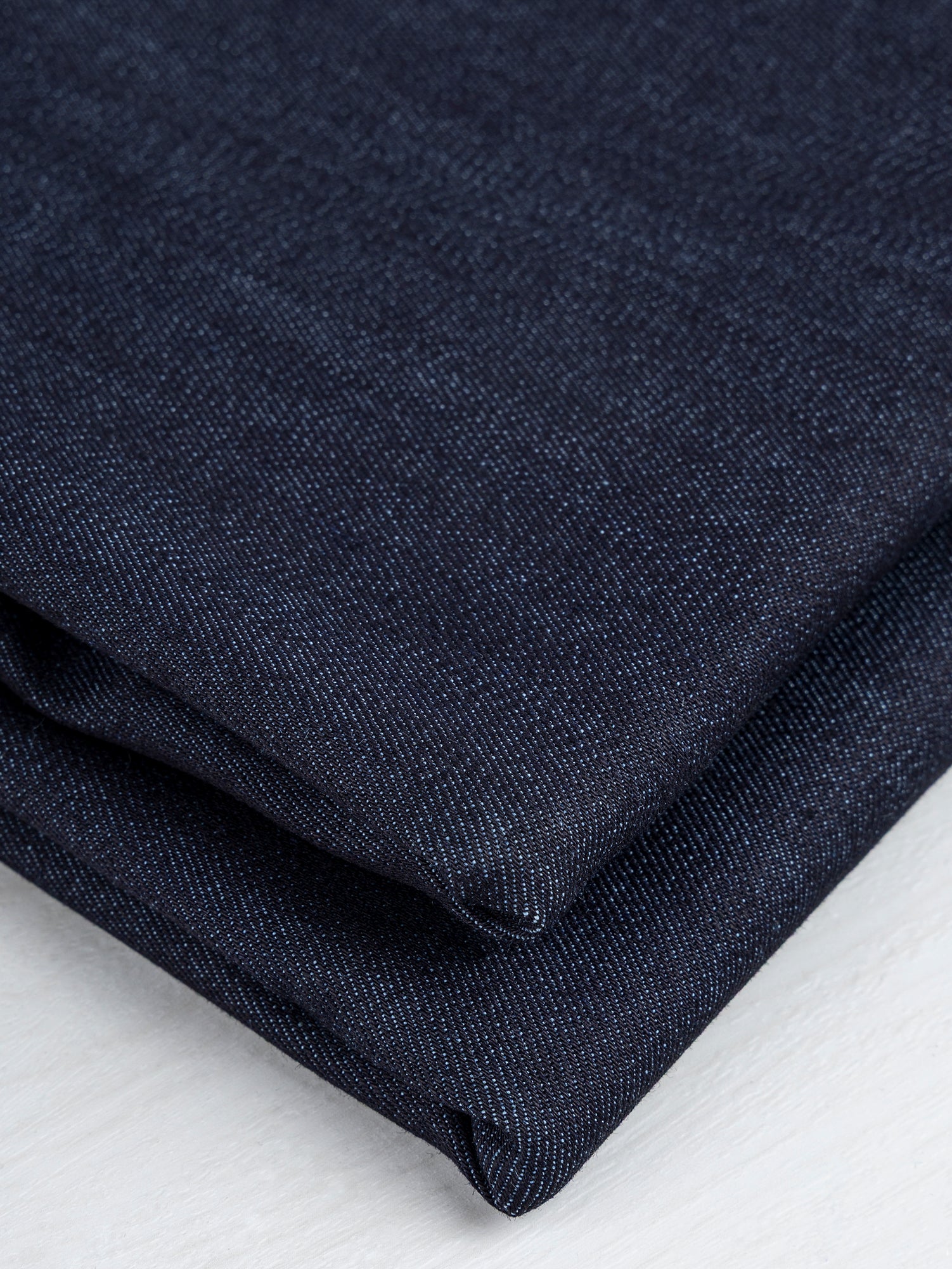 F-DEN030-Stretch-Selvedge-Denim-Deadstock-Dark-Indigo-Core-Fabrics-fold.JPG