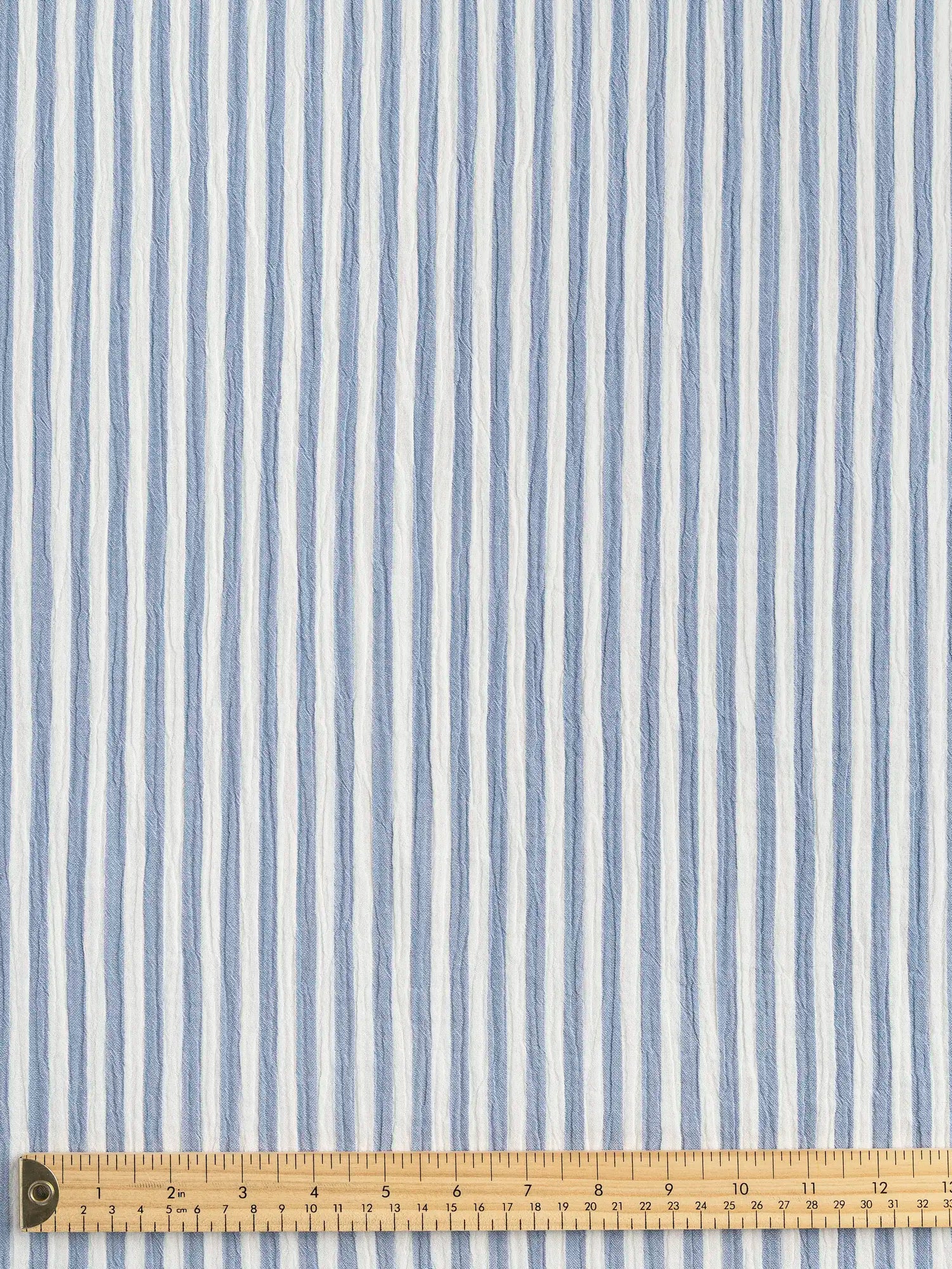 F-COT463-001-Stripe-Cotton-Double-Gauze-White-and-Chambray-Core-Fabrics-ruler.webp