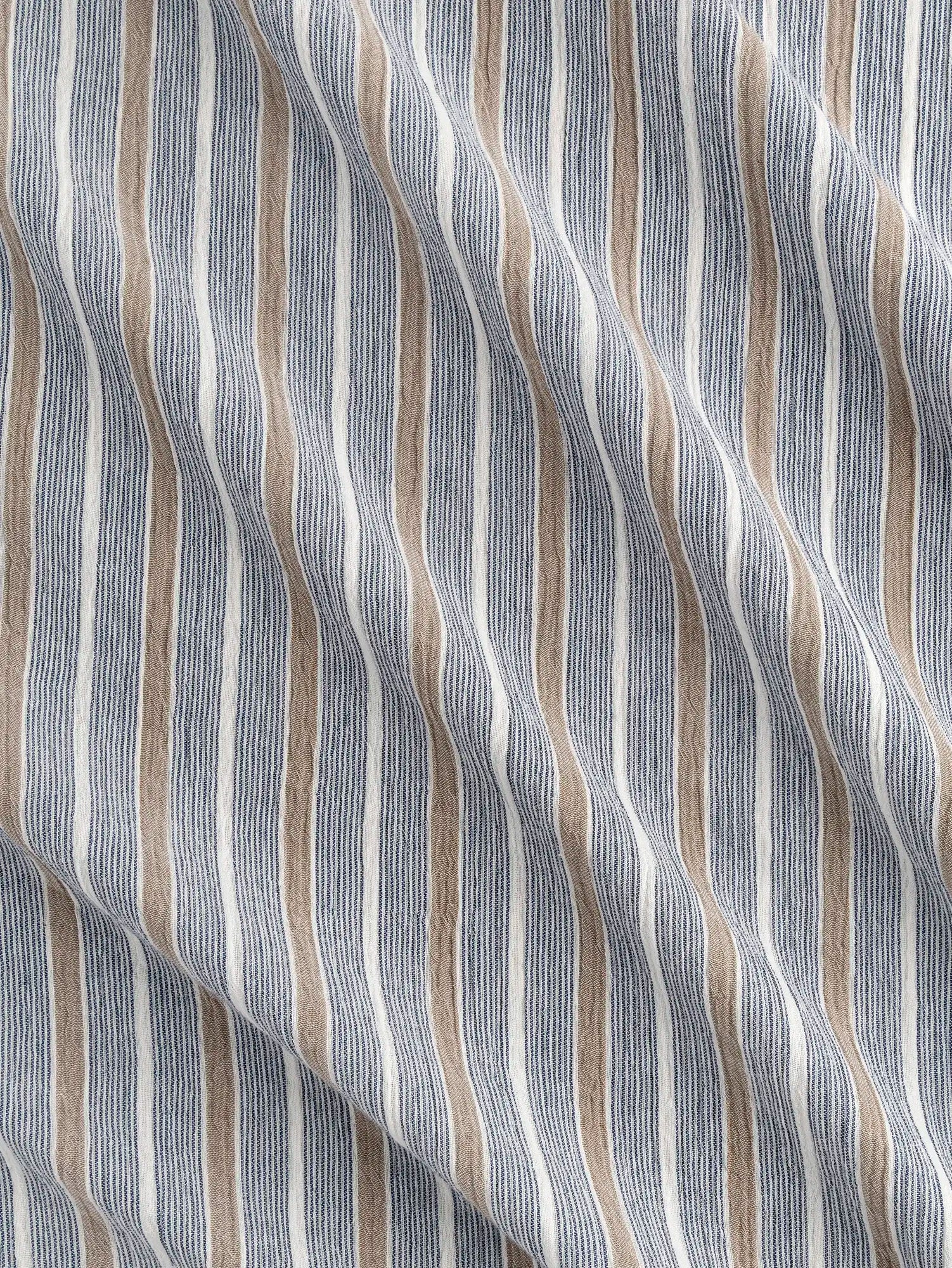 F-COT463-002-Stripe-Cotton-Double-Gauze-White-Indigo-and-Sand-Core-Fabrics-scrunched.webp