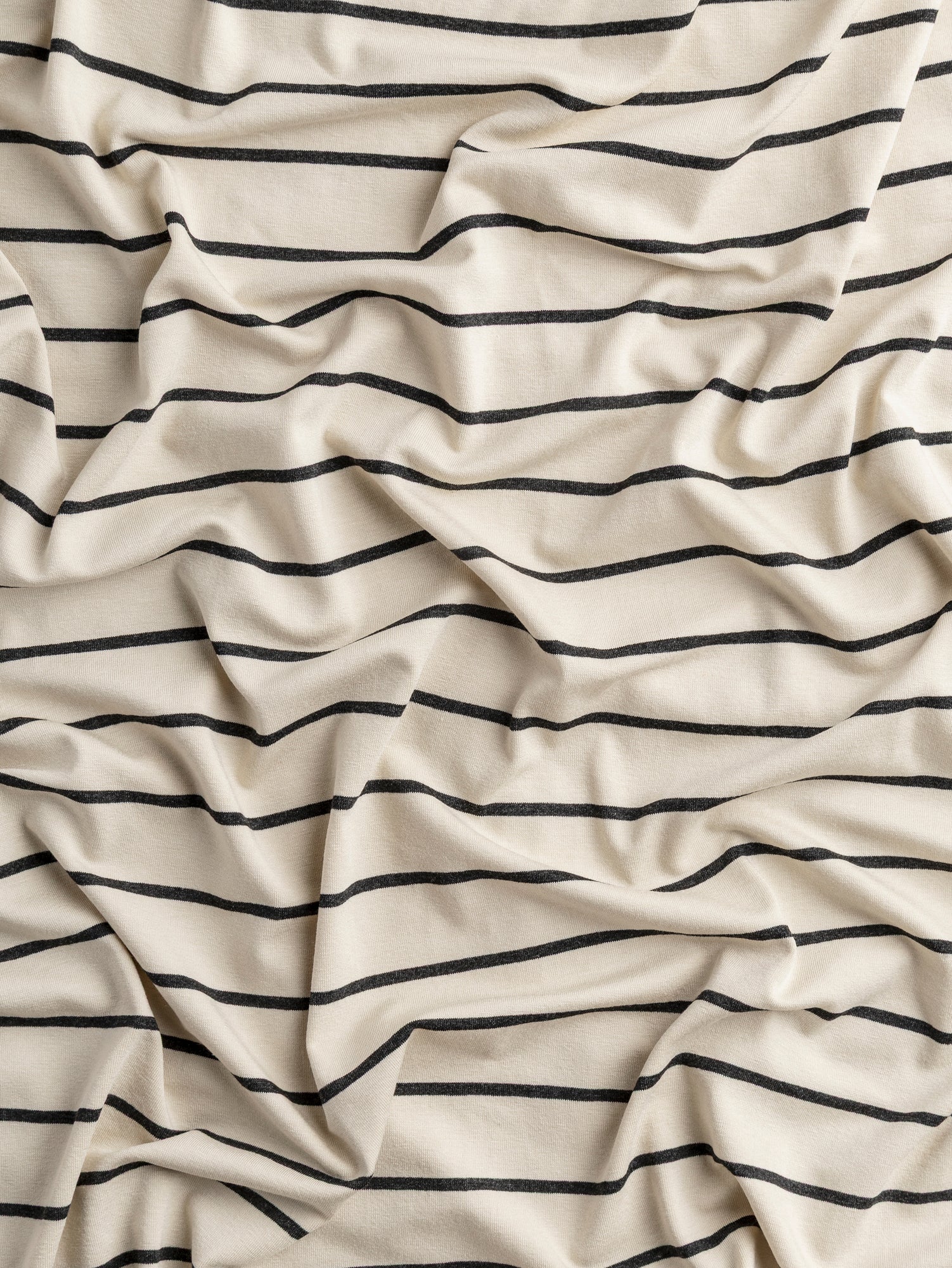 F-VIS286-001-Stripe-EcoVero-Rayon-Spandex-Jersey-Knit-Cream-Charcoal-Core-Fabrics-scrunched.JPG