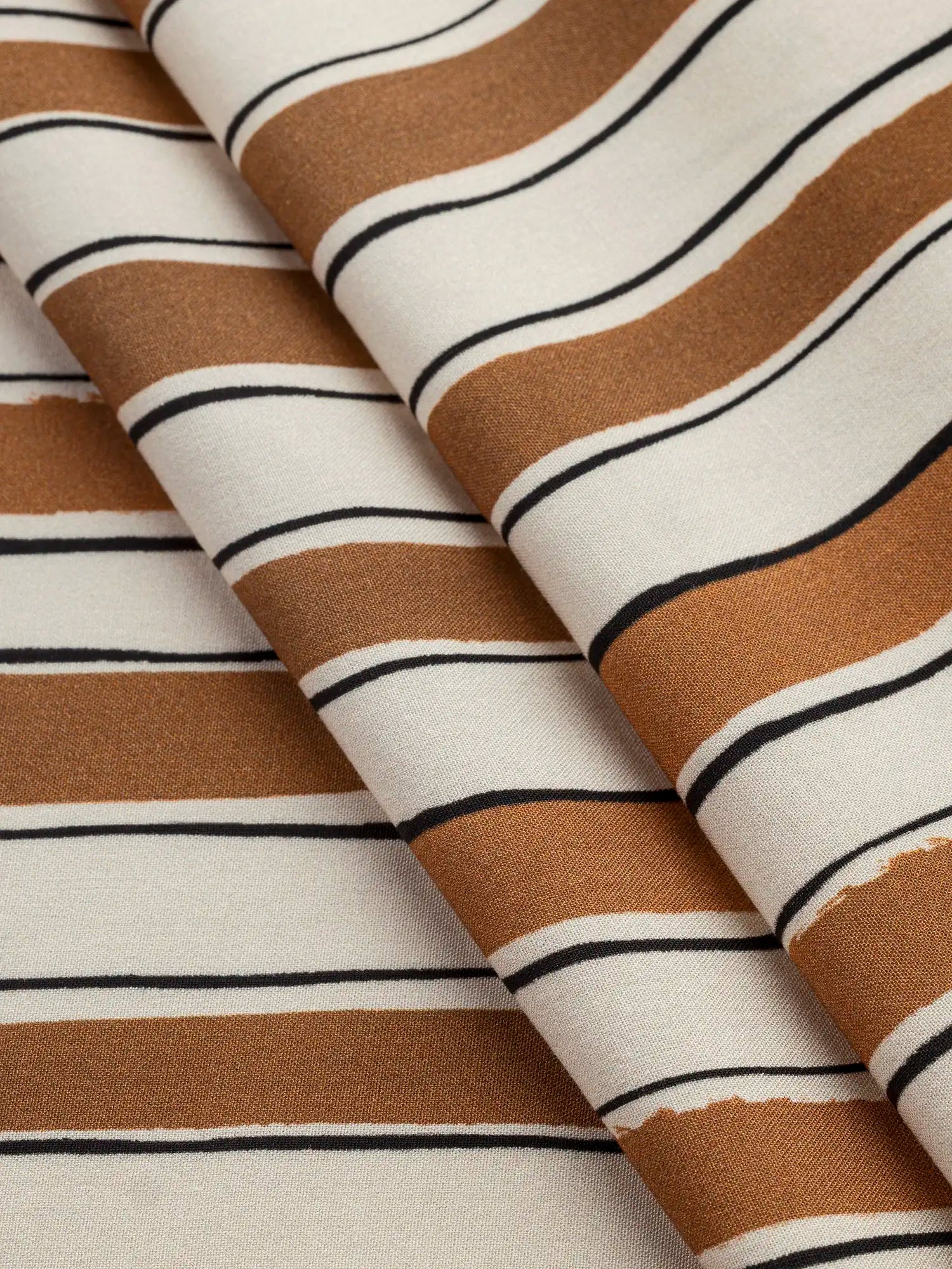 F-VIS290-Stripe-Viscose-Challis-Coffee-Cream-and-Black-Core-Fabrics-fold.webp