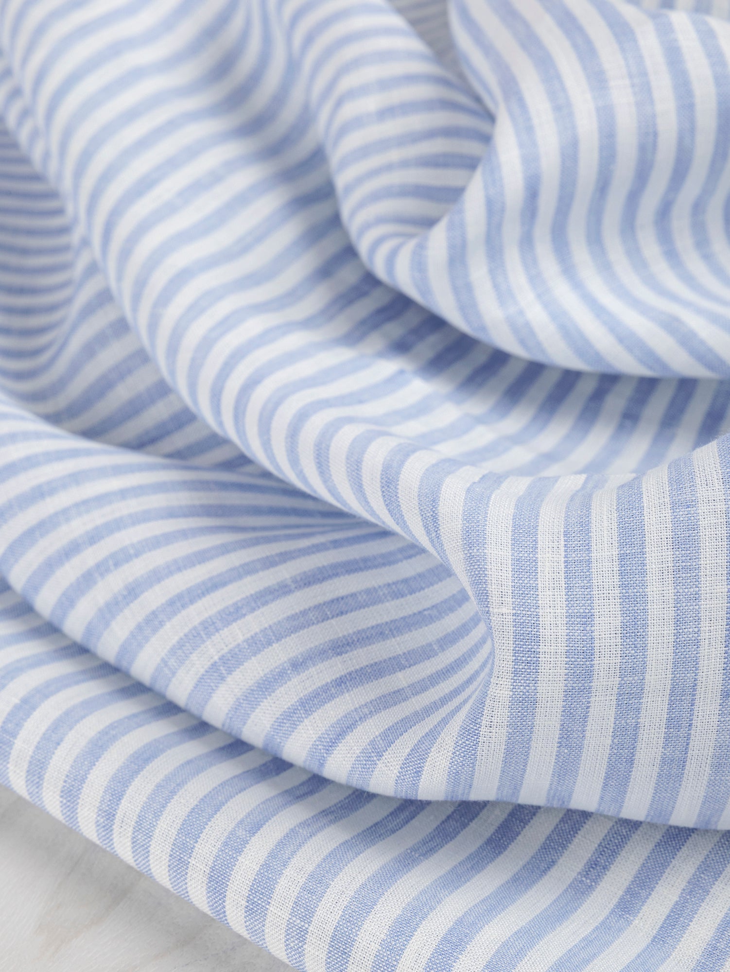 F-LIN043-003-Striped-Linen-Shirting-Light-Blue-and-White-Core-Fabrics-scrunched.JPG