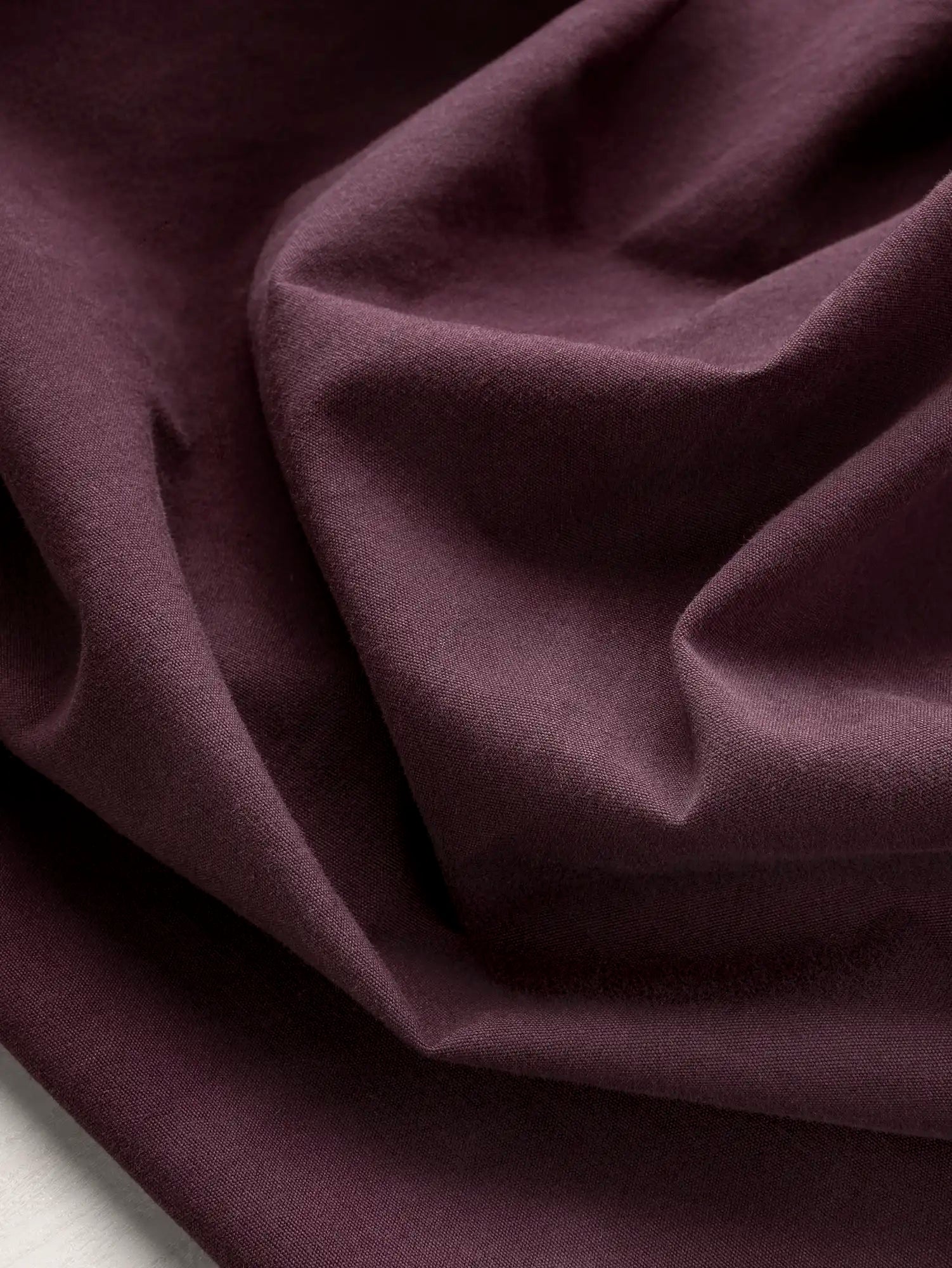 F-COT230-015-Substantial-Organic-Cotton-Broadcloth-Aubergine-Core-Fabrics-scrunched.webp