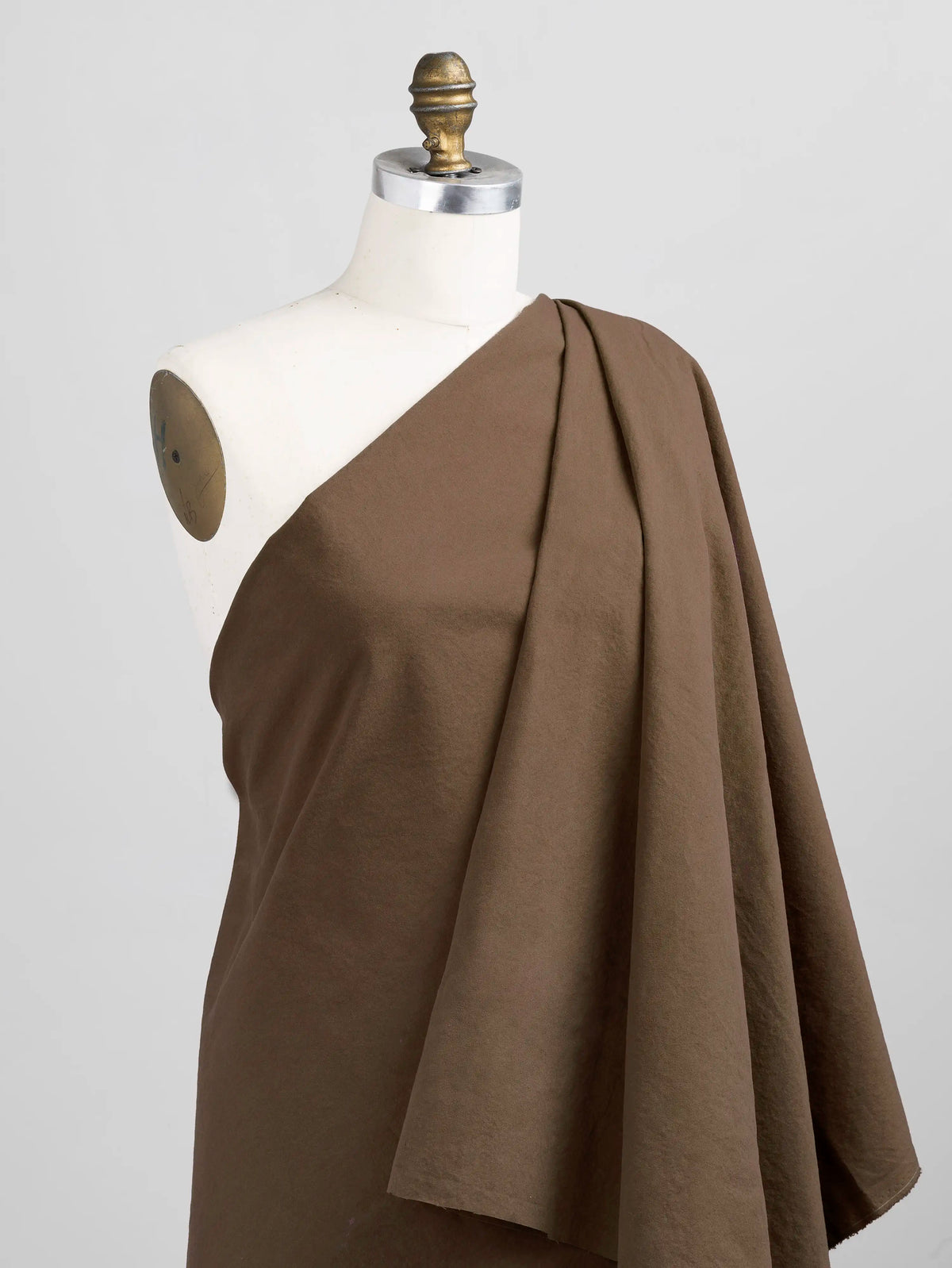 FF-COT230-016-Substantial-Organic-Cotton-Broadcloth-Chocolate-Core-Fabrics-draped.webp