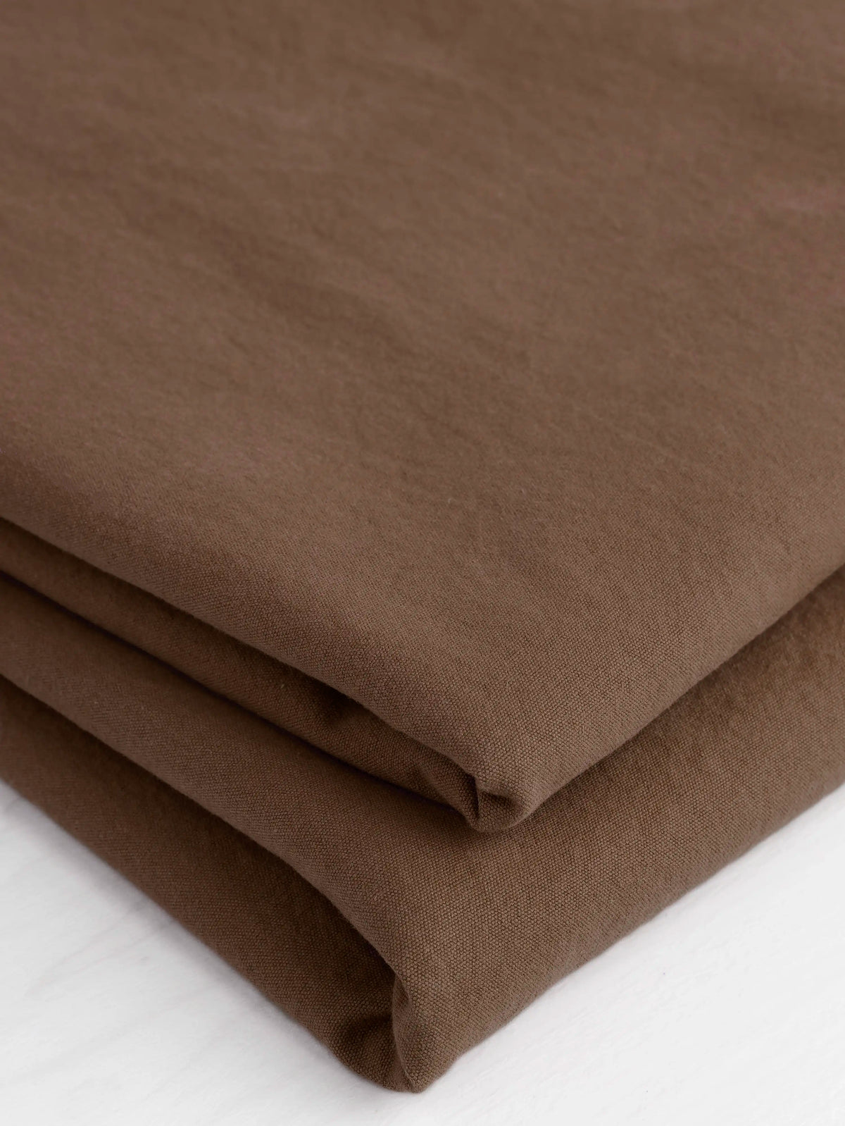F-COT230-016-Substantial-Organic-Cotton-Broadcloth-Chocolate-Core-Fabrics-fold.webp