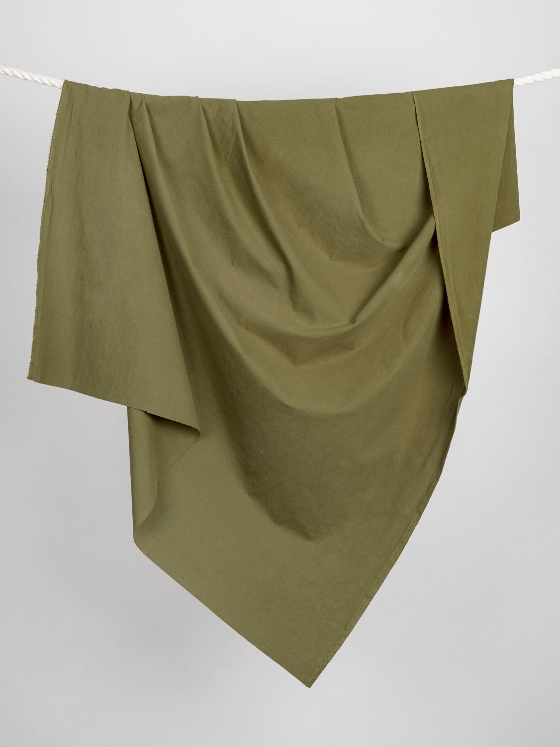 F-COT230-012-Substantial-Organic-Cotton-Broadcloth-Olive-Core-Fabrics-draped