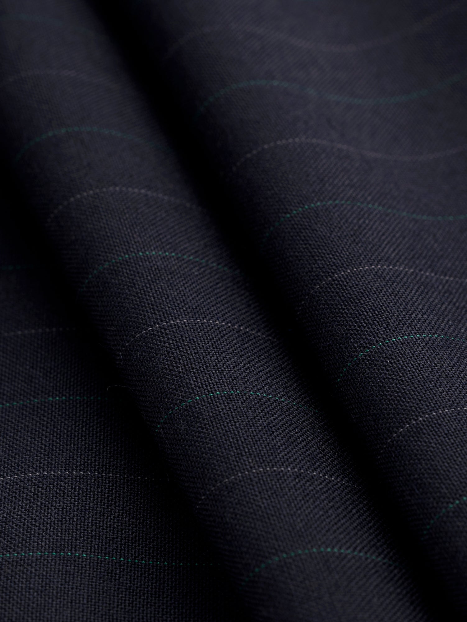 F-WOL113-Subtle-Pinstripe-Italian-Wool-Suiting-Deadstock-Navy-Green-and-White-Core-Fabrics-fold.JPG