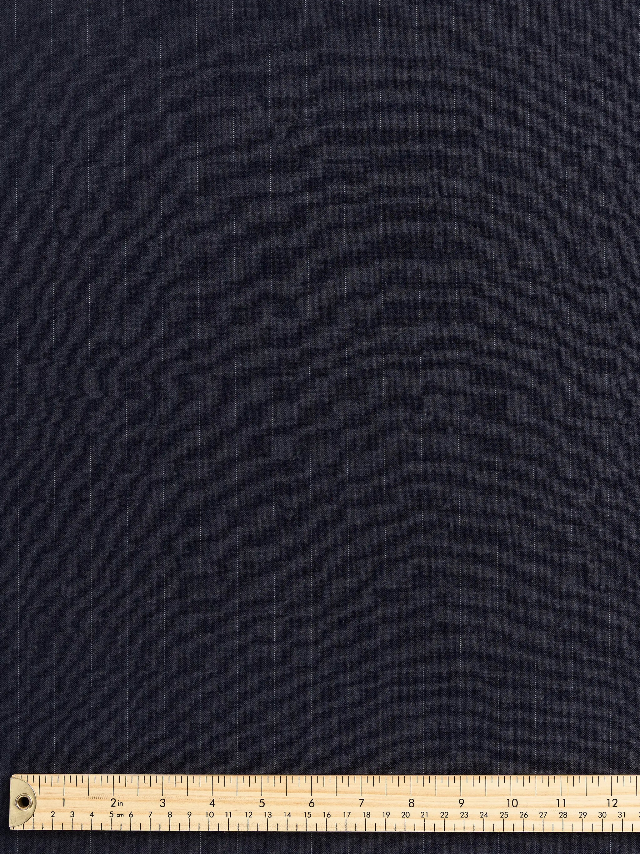 F-WOL105-Subtle-Pinstripe-Italian-Wool-Suiting-Deadstock-Navy-and-White-Core-Fabrics-ruler.webp