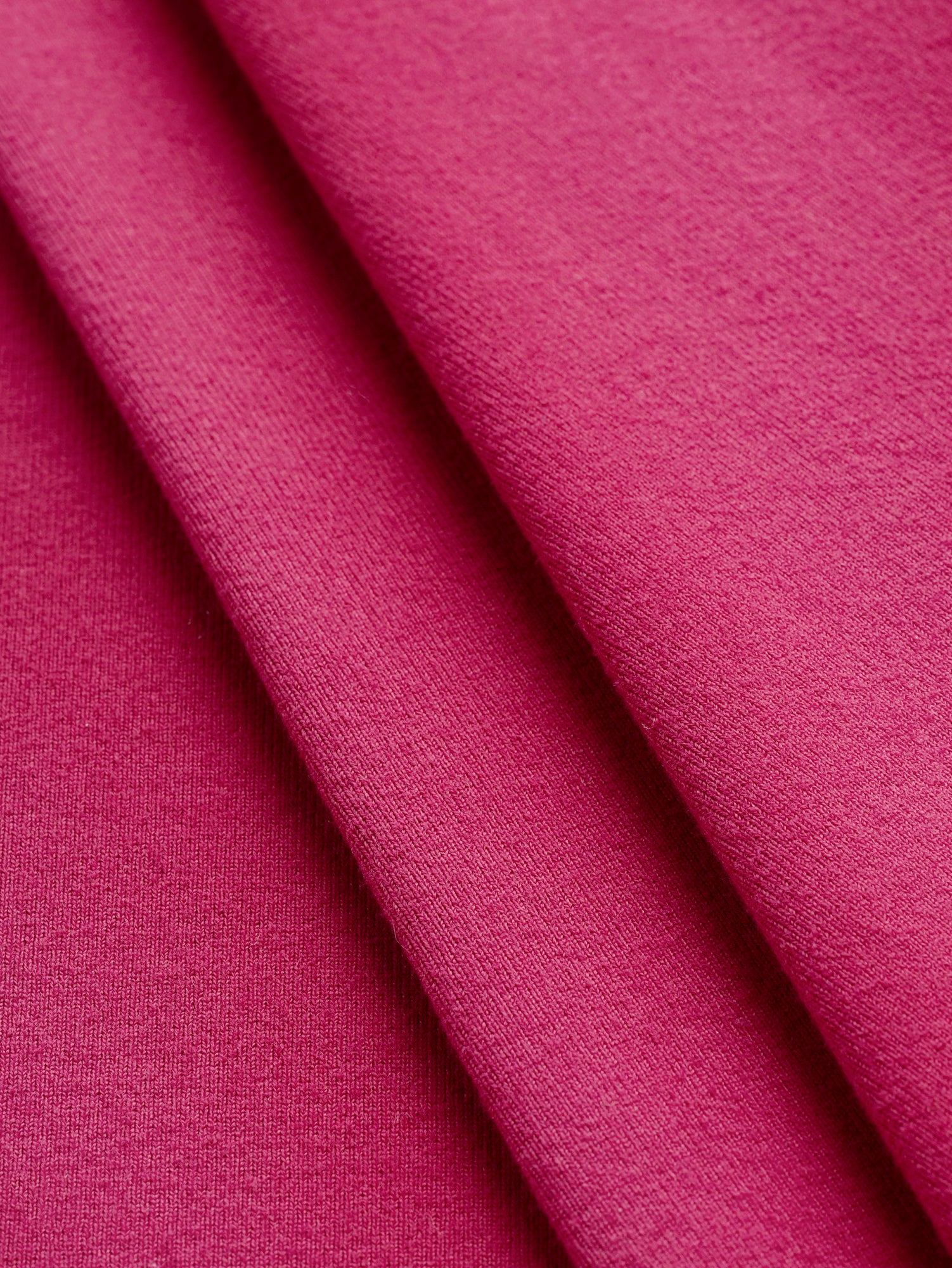 F-DEA106-Supplex-Stretch-Knit-Deadstock-Raspberry-Core-Fabrics-fold.JPG