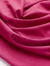 F-DEA106-Supplex-Stretch-Knit-Deadstock-Raspberry-Core-Fabrics-scrunching.JPG