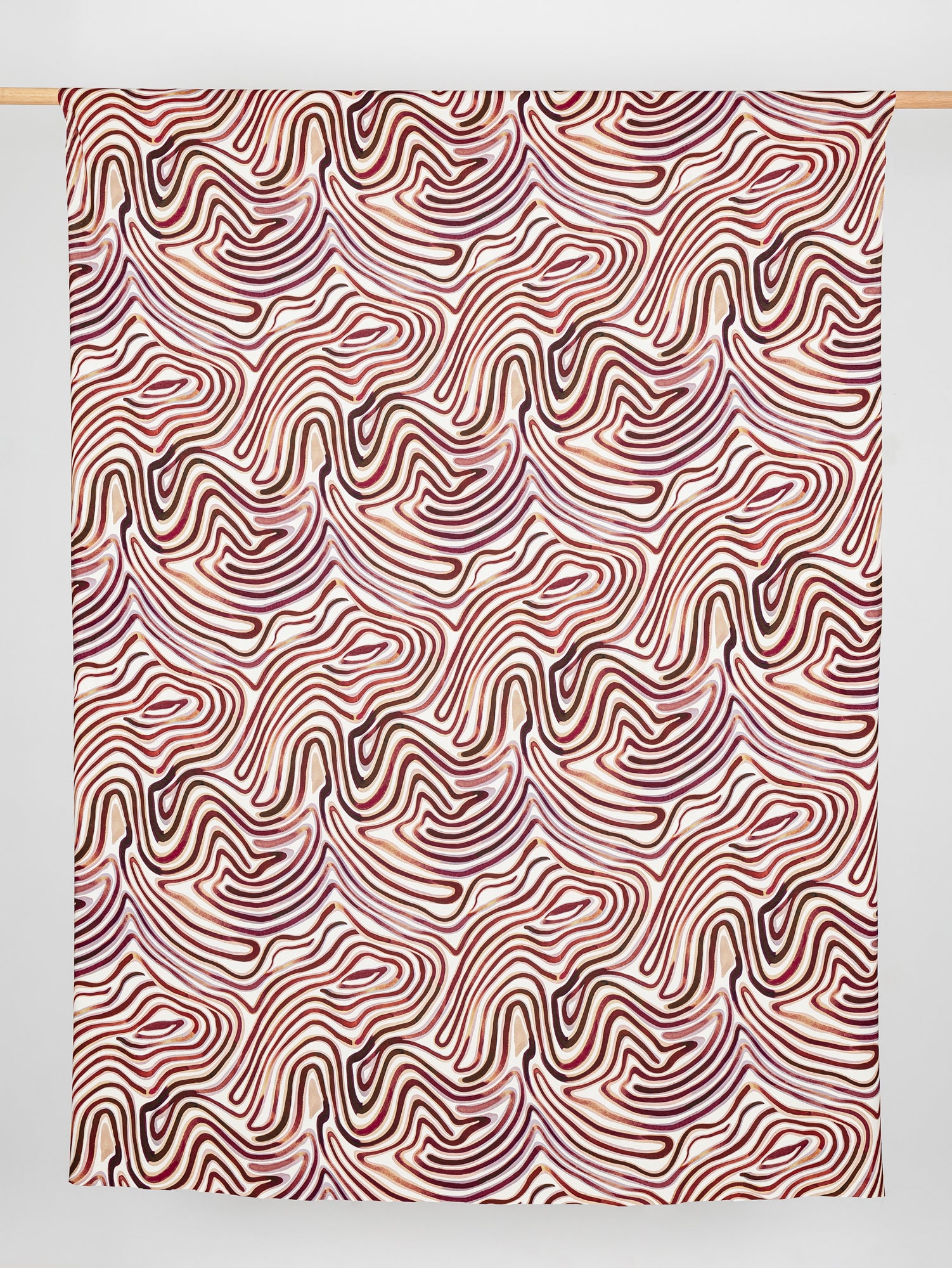 F-VIS270-Swirl-Scene-Print-Viscose-Knit-Brown-Cream-Core-Fabrics-draped.JPG