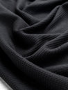 F-DEA093-Tencel-Blend-Stretch-Waffle-Knit-Deadstock-Black-Core-Fabrics-scrunched.JPG