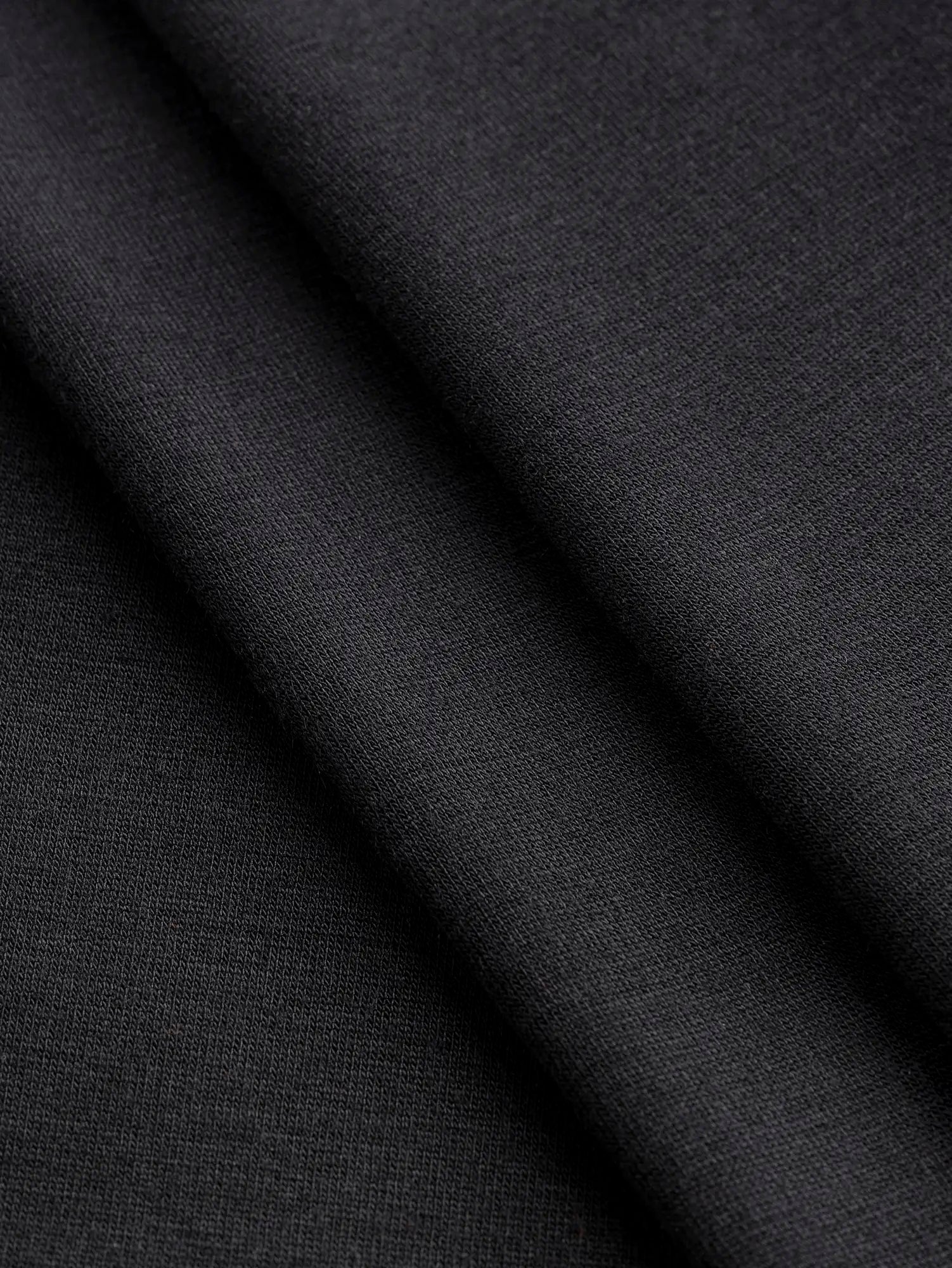 F-DEA202-Tencel-Cotton-Spandex-Stretch-Knit-Deadstock-Black-Core-Fabrics-fold.webp
