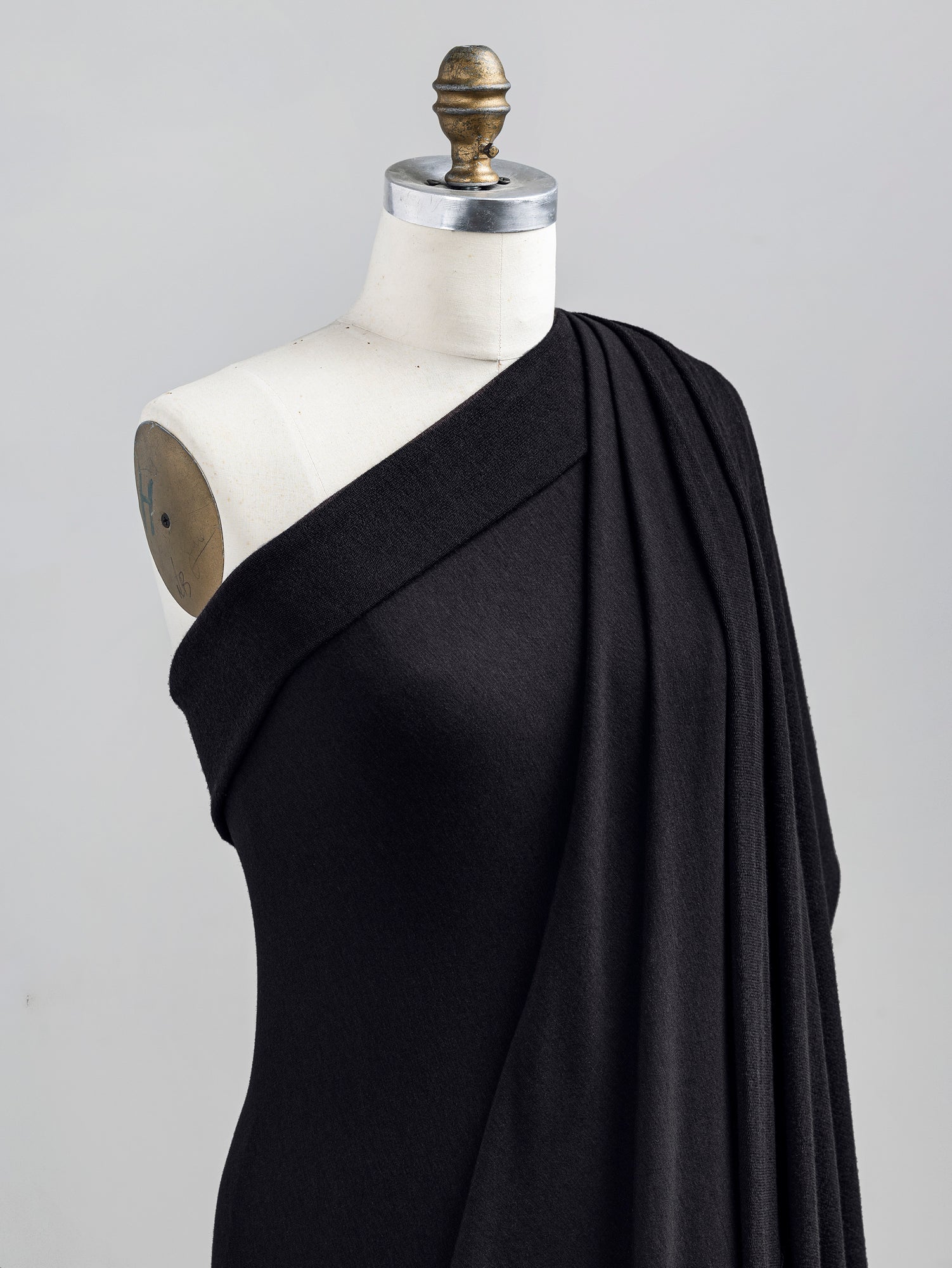 F-TEN014-001-Tencel-Lyocell-Organic-Cotton-Stretch-French-Terry-Black-Core-Fabrics-draped