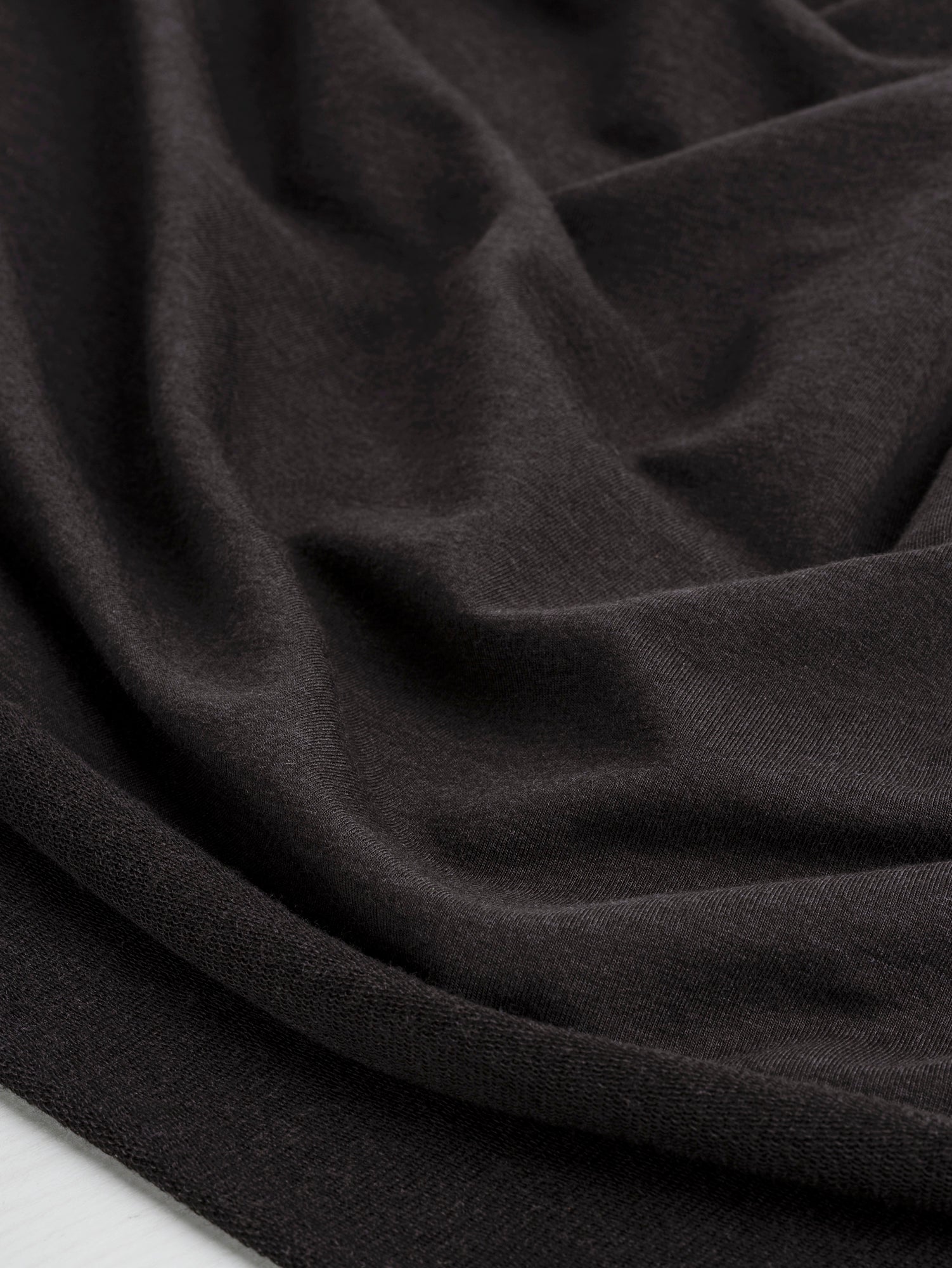 F-TEN014-002-Tencel-Lyocell-Organic-Cotton-Stretch-French-Terry-Dark-Coffee-Core-Fabrics-scrunched
