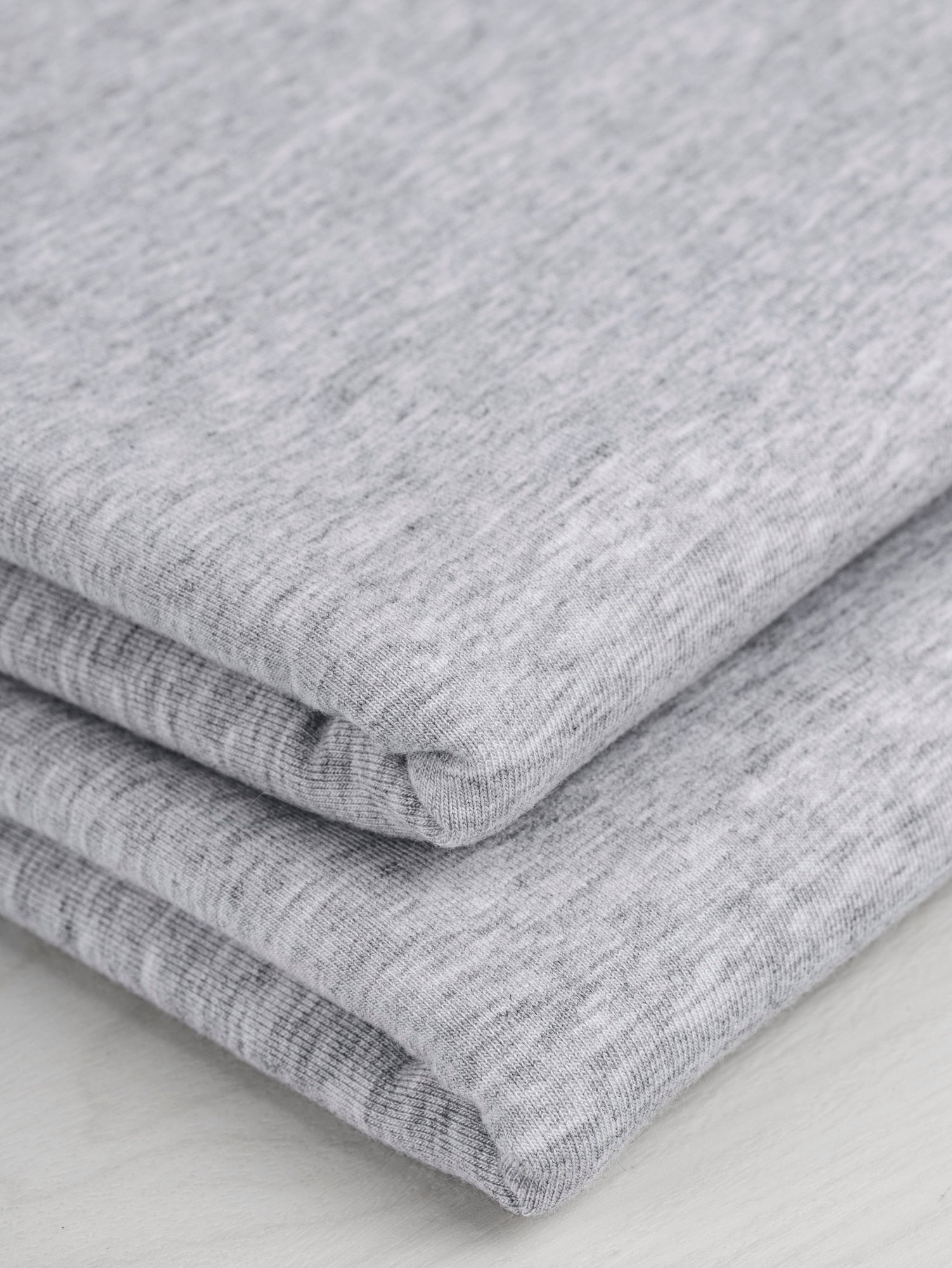 F-TEN014-006-Tencel-Lyocell-Organic-Cotton-Stretch-French-Terry-Heather-Grey-Core-Fabrics-fold