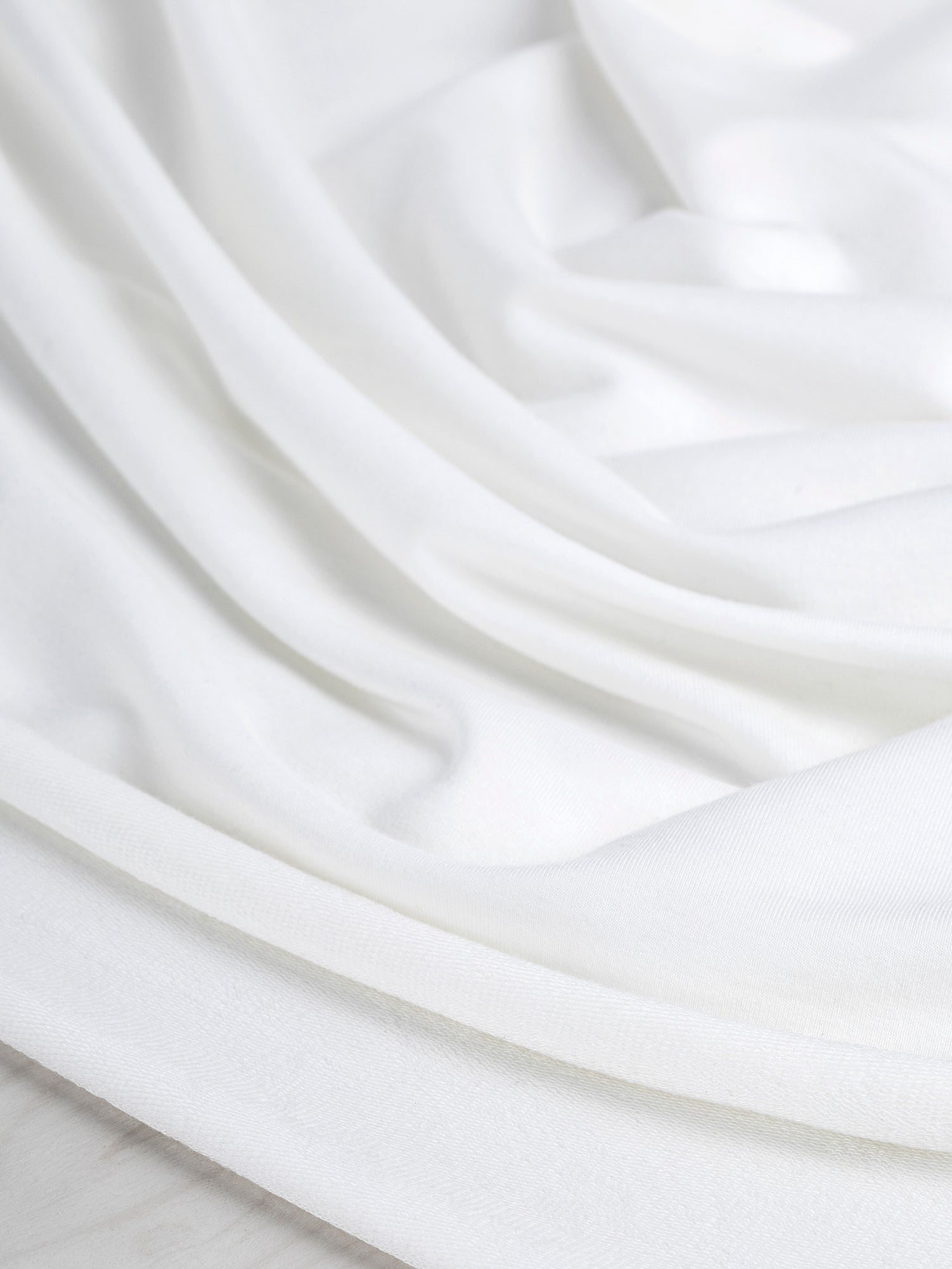 F-TEN014-009-Tencel-Lyocell-Organic-Cotton-Stretch-French-Terry-Ivory-Core-Fabrics-scrunched