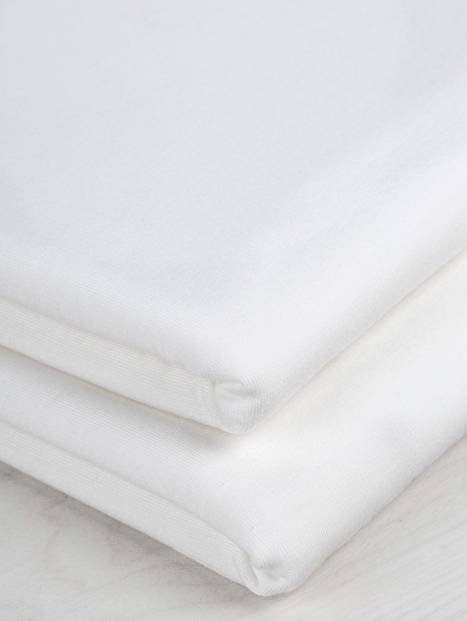 F-TEN014-009-Tencel-Lyocell-Organic-Cotton-Stretch-French-Terry-Ivory-Core-Fabrics-fold