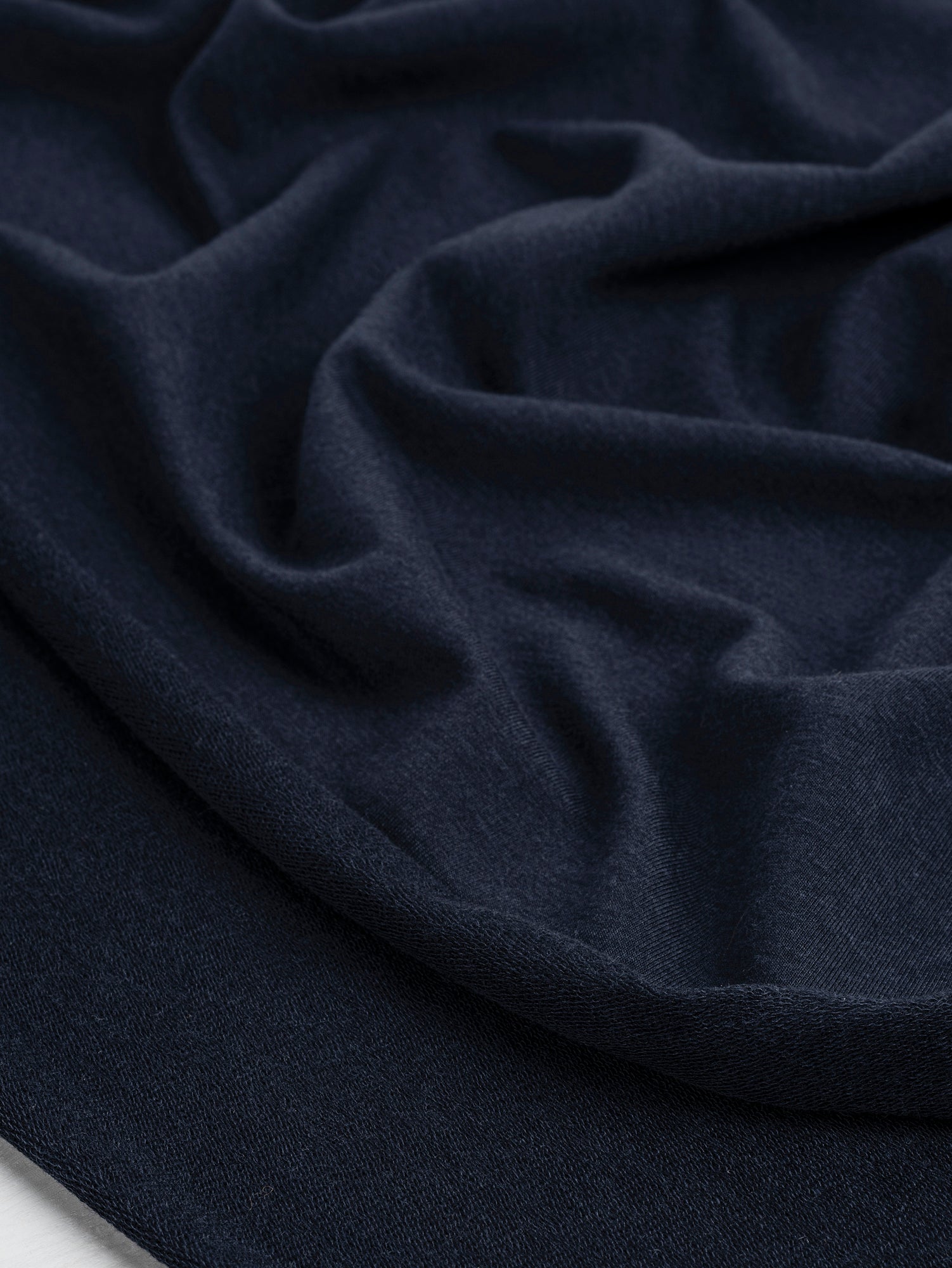 F-TEN014-007-Tencel-Lyocell-Organic-Cotton-Stretch-French-Terry-Navy-Core-Fabrics-scrunched