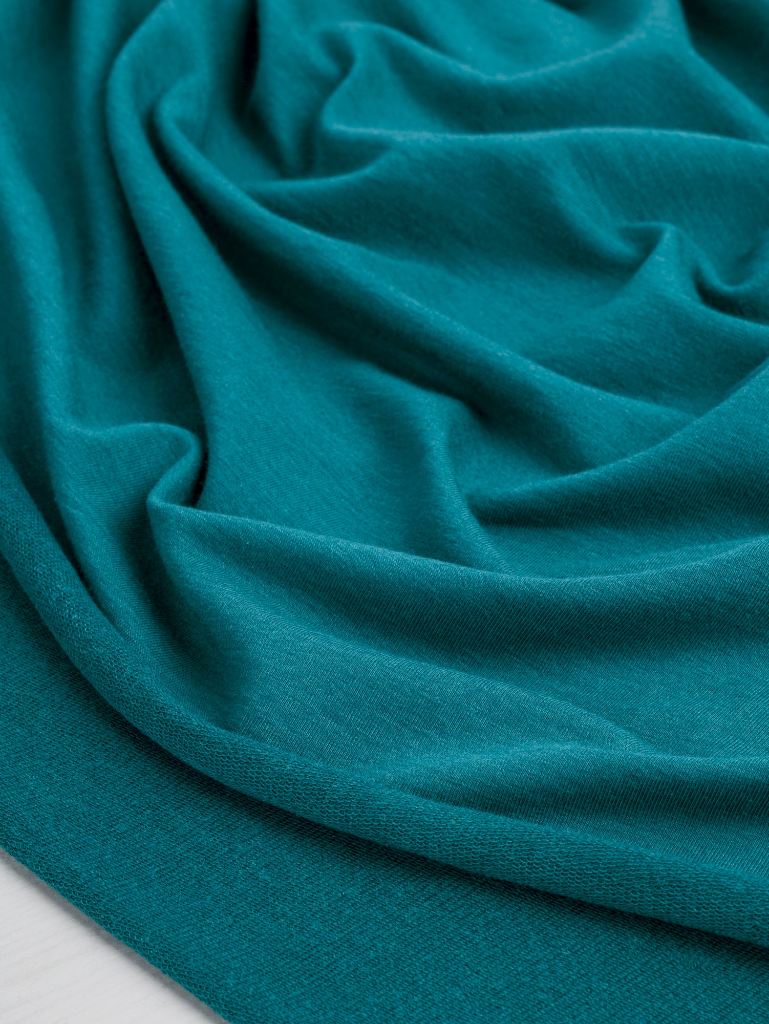 F-TEN014-011-Tencel-Lyocell-Organic-Cotton-Stretch-French-Terry-Peacock-Core-Fabrics-scrunched