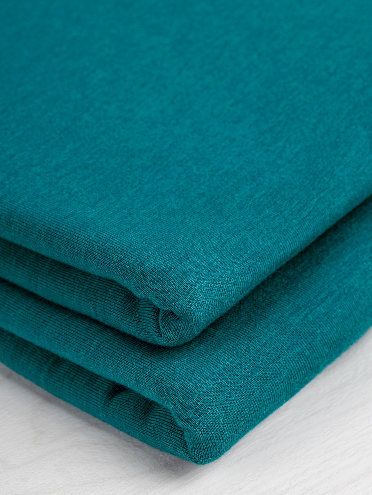 F-TEN014-011-Tencel-Lyocell-Organic-Cotton-Stretch-French-Terry-Peacock-Core-Fabrics-fold