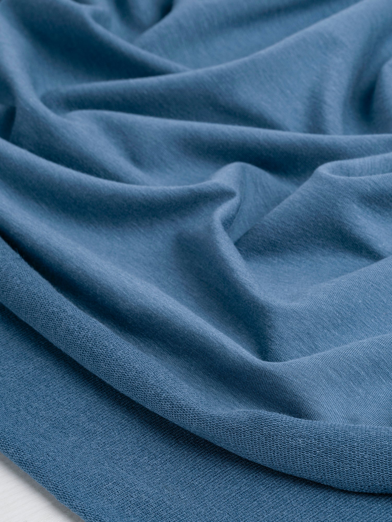 F-TEN014-003-Tencel-Lyocell-Organic-Cotton-Stretch-French-Terry-Steel-Blue-Core-Fabrics-scrunched