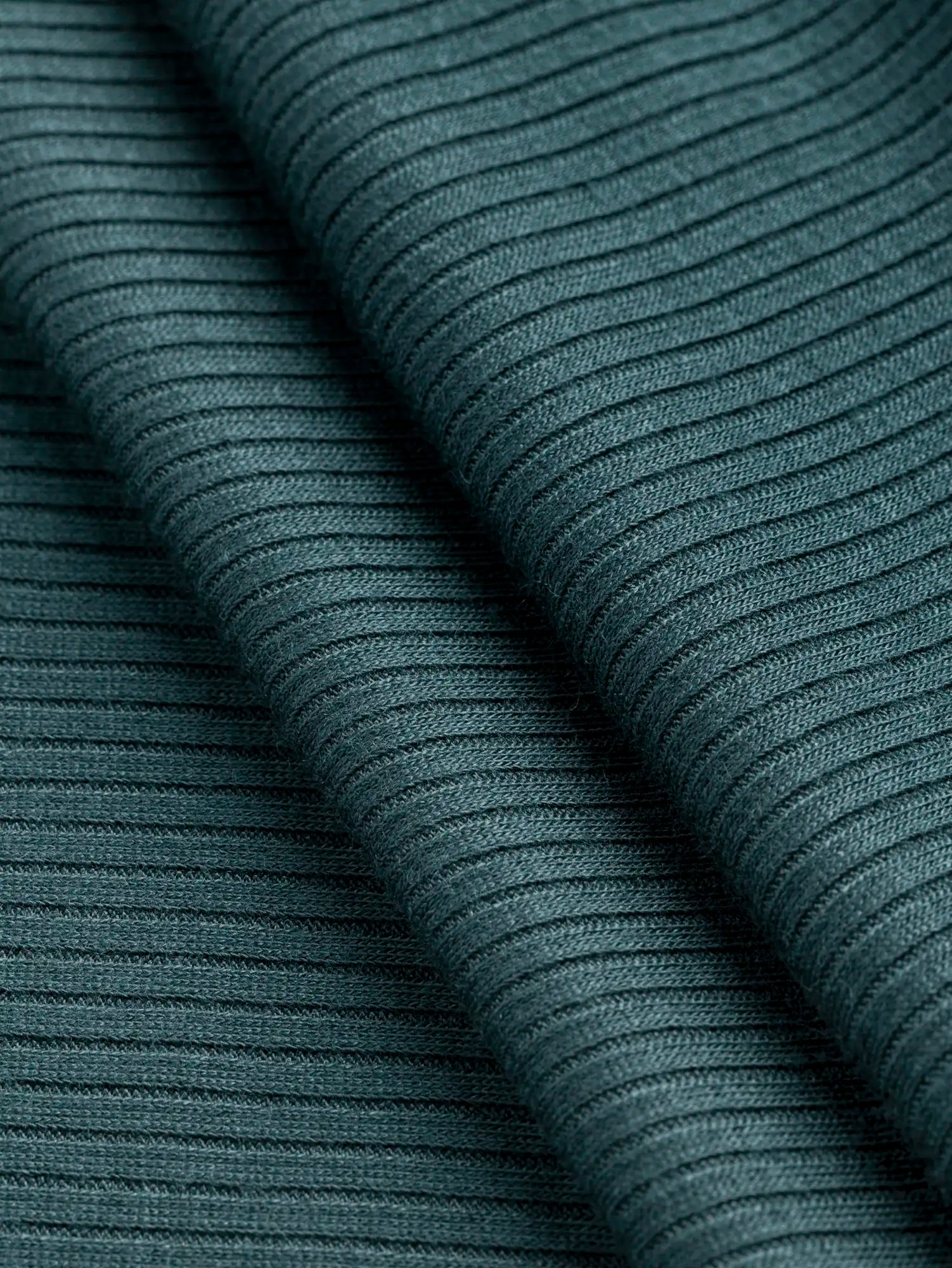 F-TEN009-015-Tencel-Modal-Spandex-Ribbed-Knit-Forest-Core-Fabrics-fold.webp