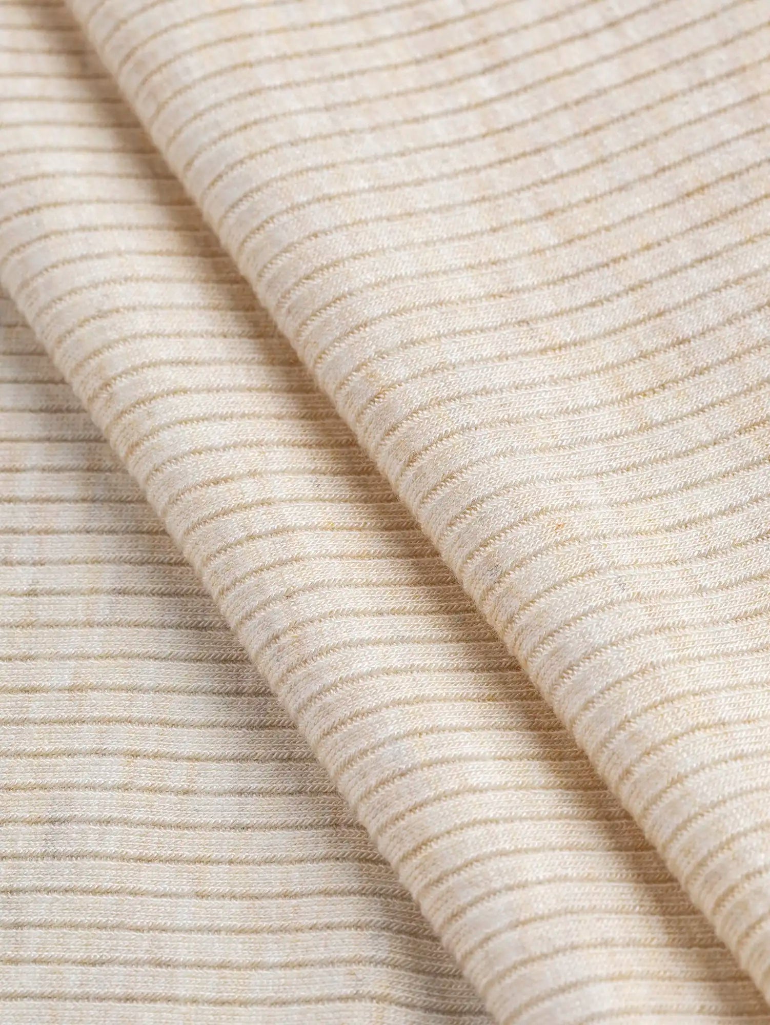F-TEN009-013-Tencel-Modal-Spandex-Ribbed-Knit-Oat-Core-Fabrics-fold.webp