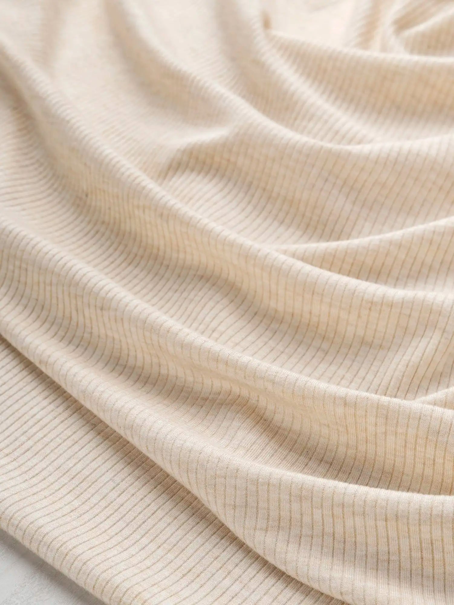 F-TEN009-013-Tencel-Modal-Spandex-Ribbed-Knit-Oat-Core-Fabrics-scrunched.webp