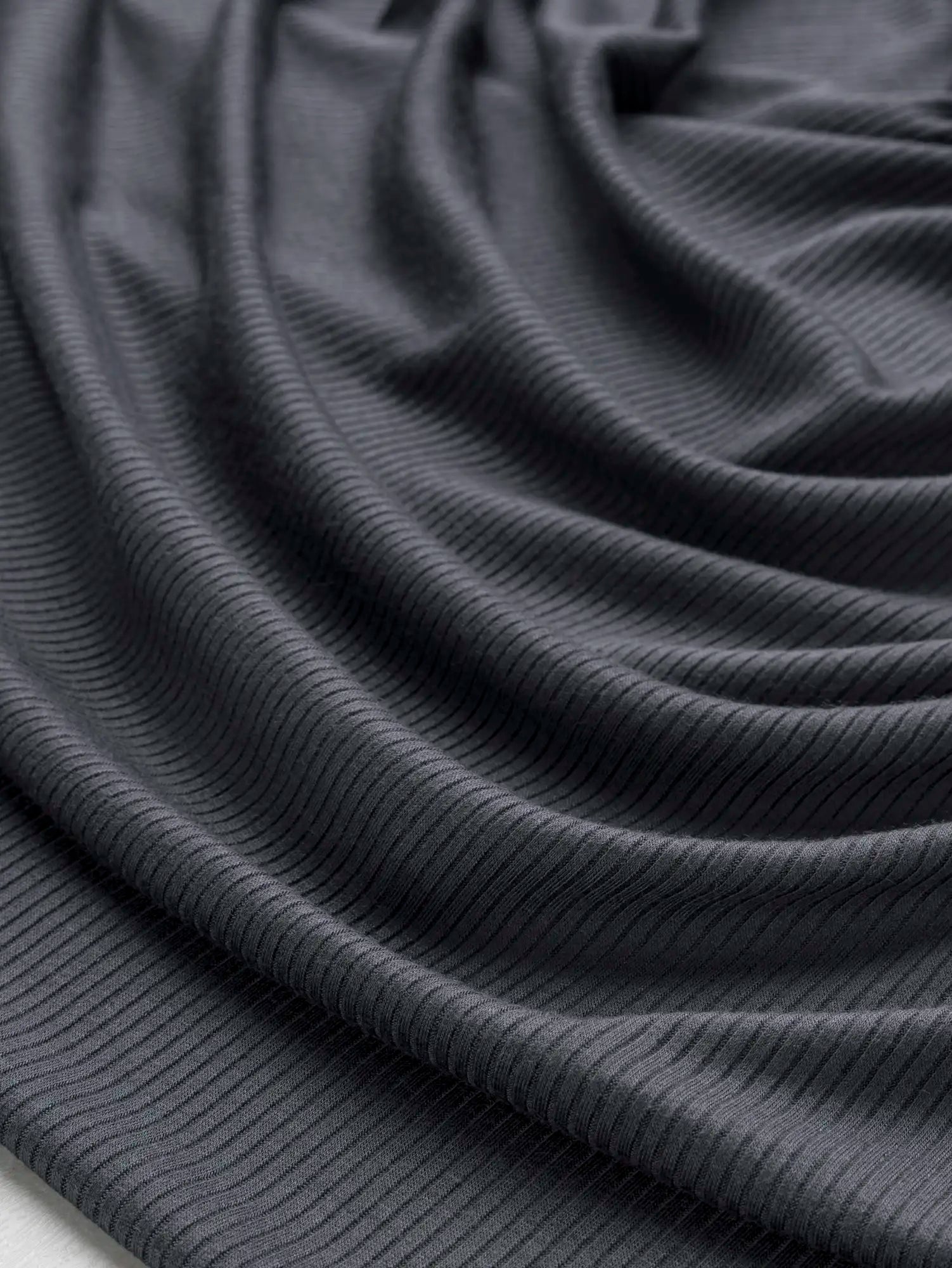 F-TEN009-016-Tencel-Modal-Spandex-Ribbed-Knit-Slate-Core-Fabrics-scrunched.webp