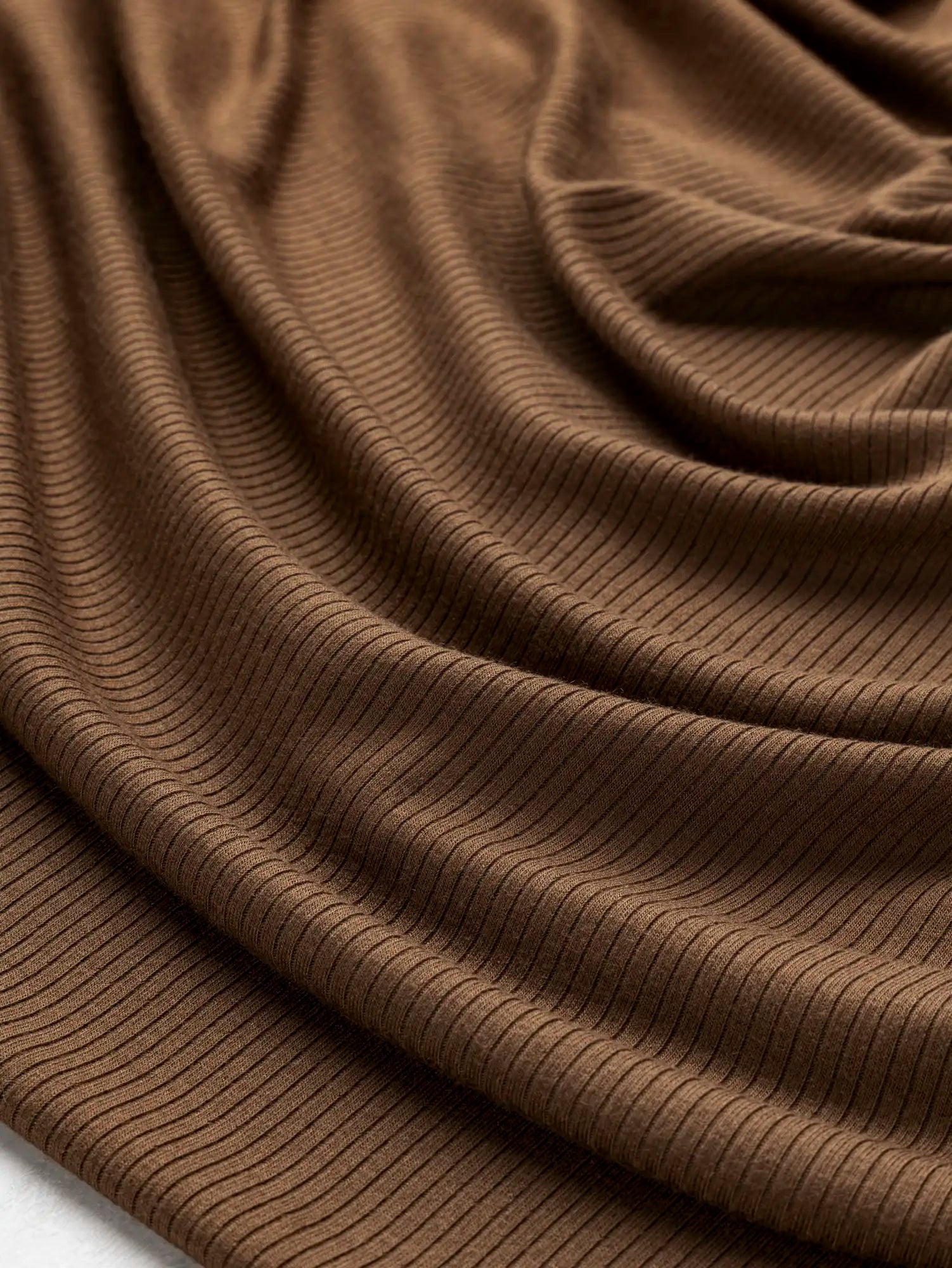 F-TEN009-014-Tencel-Modal-Spandex-Ribbed-Knit-Toffee-Core-Fabrics-scrunched.webp
