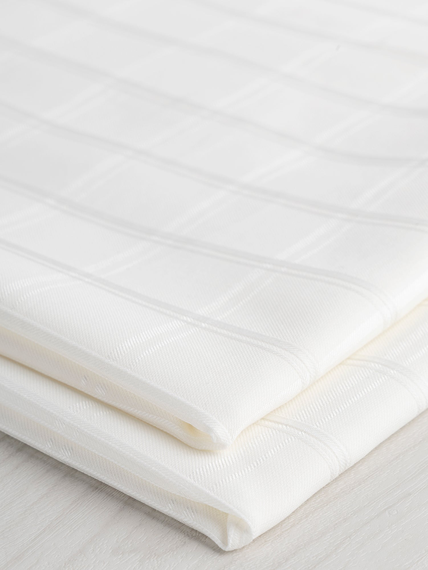 F-COT366-001-Textured-Check-Japanese-Cotton-Voile-White-Core-Fabrics-fold.JPG