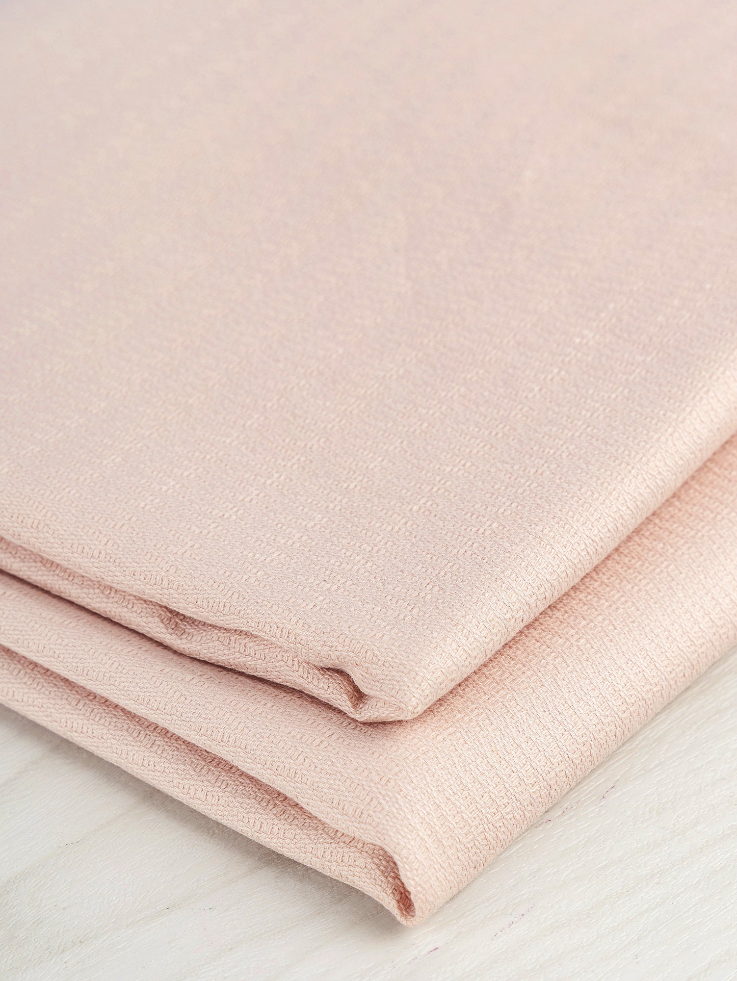 F-DEA047-002-Textured-Cotton-Jacquard-Deadstock-Powder-Pink-Core-Fabrics-fold.JPG